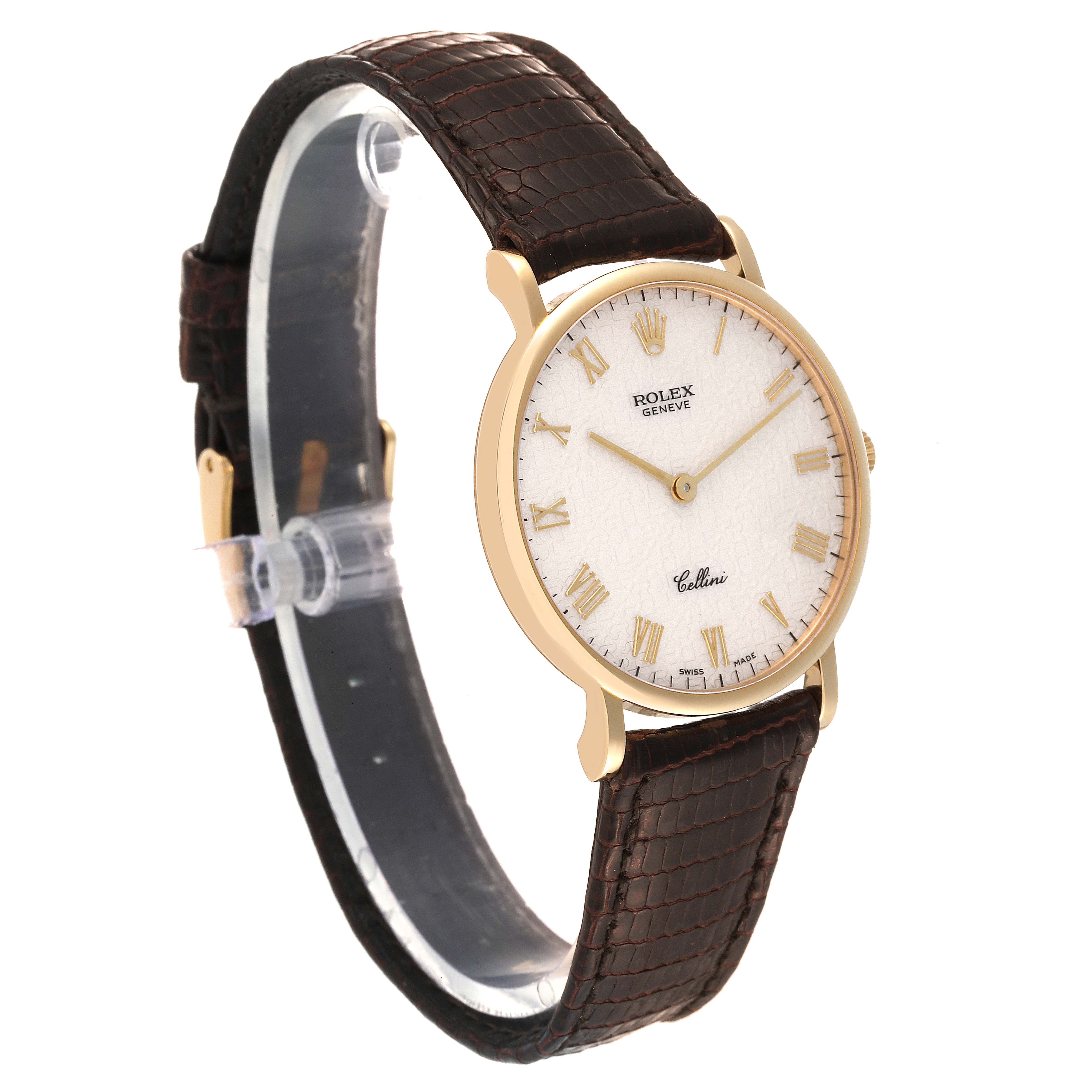 The image shows a side-angle view of a Rolex Cellini 5112 Men's Yellow Gold Beige Dial 5112 Men's Yellow Gold Beige Dial watch, highlighting its gold case, white dial with Roman numerals, and brown leather strap.