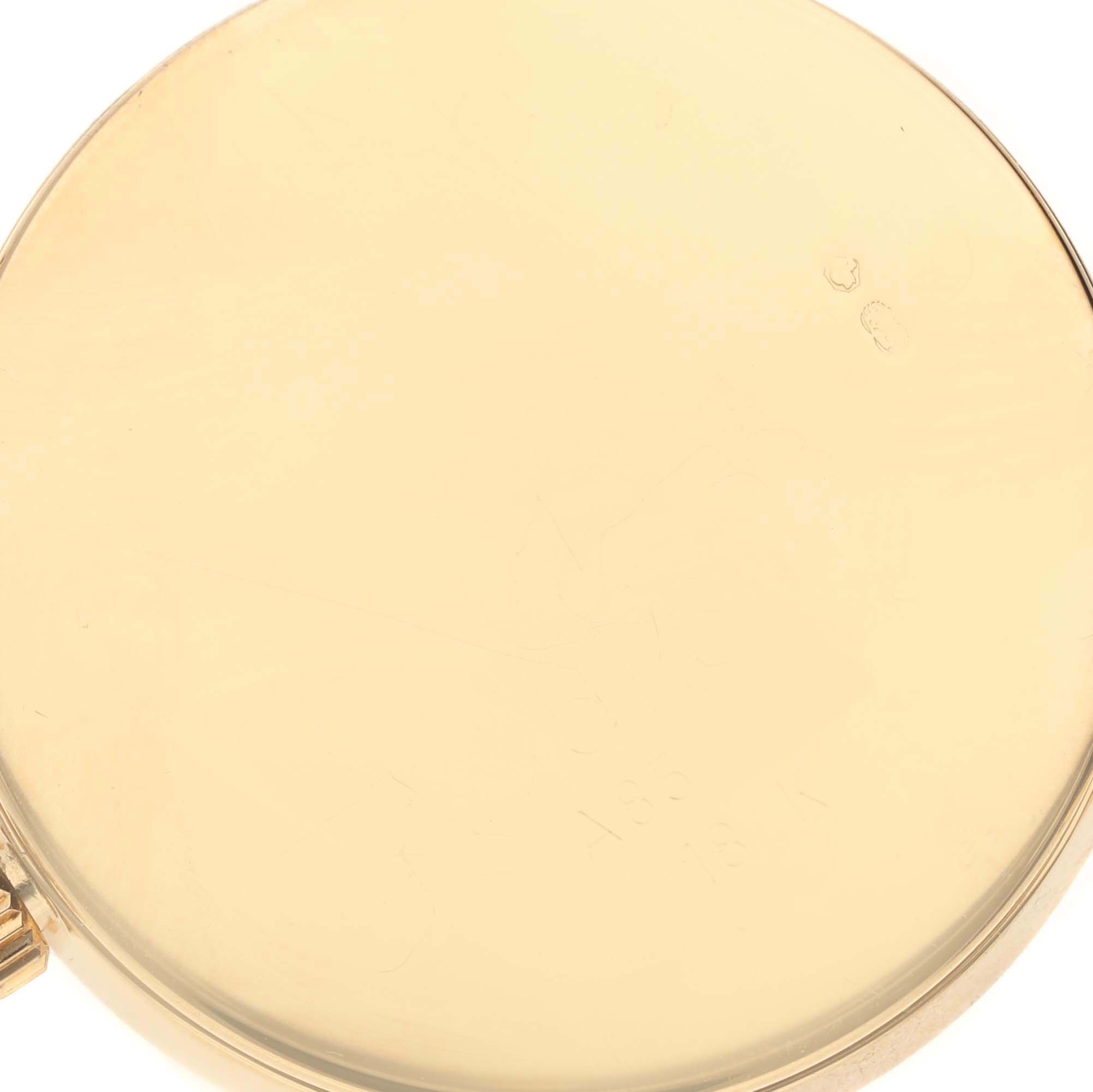 This image shows the back case of a Rolex Cellini 5116 Men's Yellow Gold White Dial 5116 Men's Yellow Gold White Dial watch from a close-up angle.