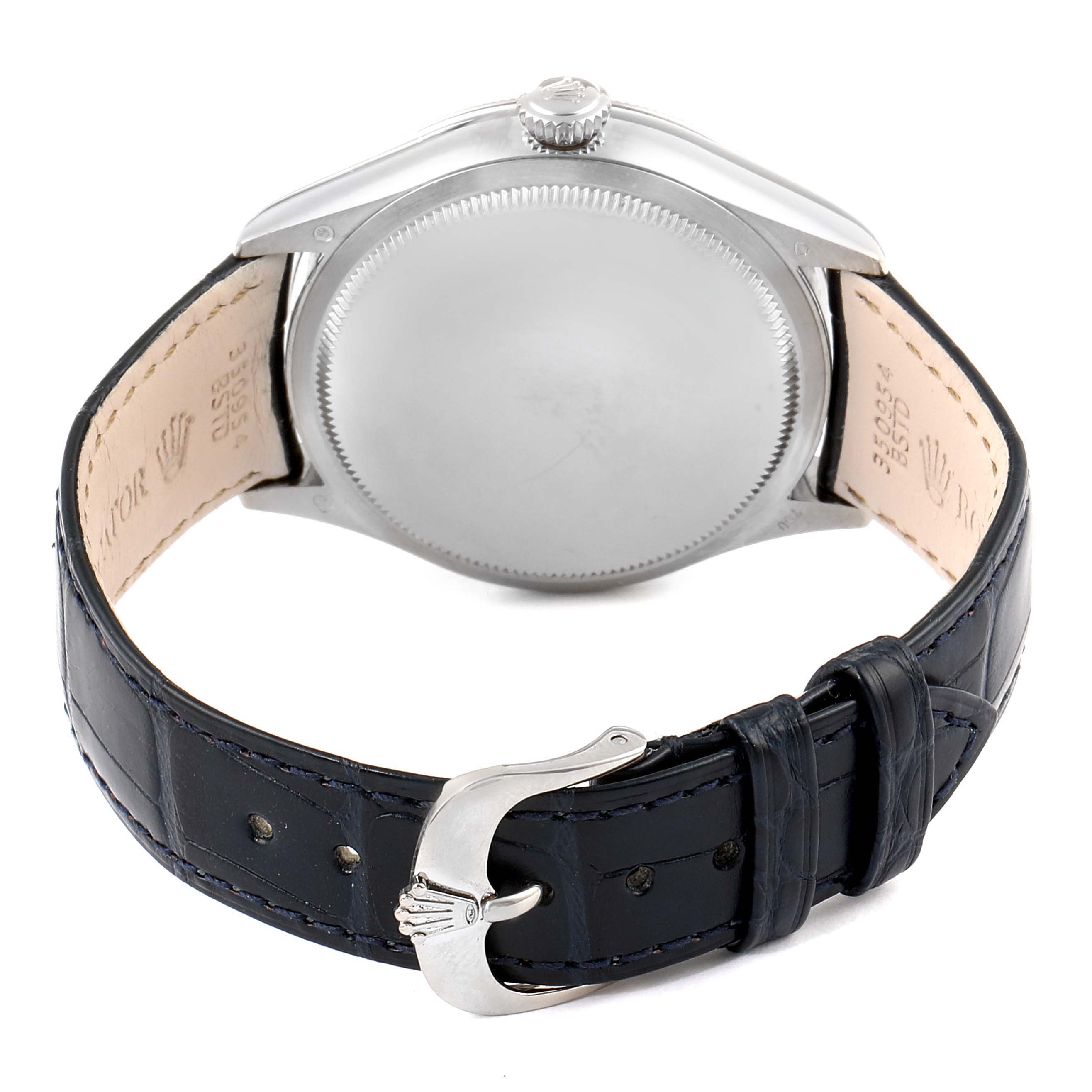 This image shows a rear view of the Rolex Cellini 50519 Men's White Gold Blue Dial 50519 Men's White Gold Blue Dial watch, highlighting its case back and leather strap with a buckle.