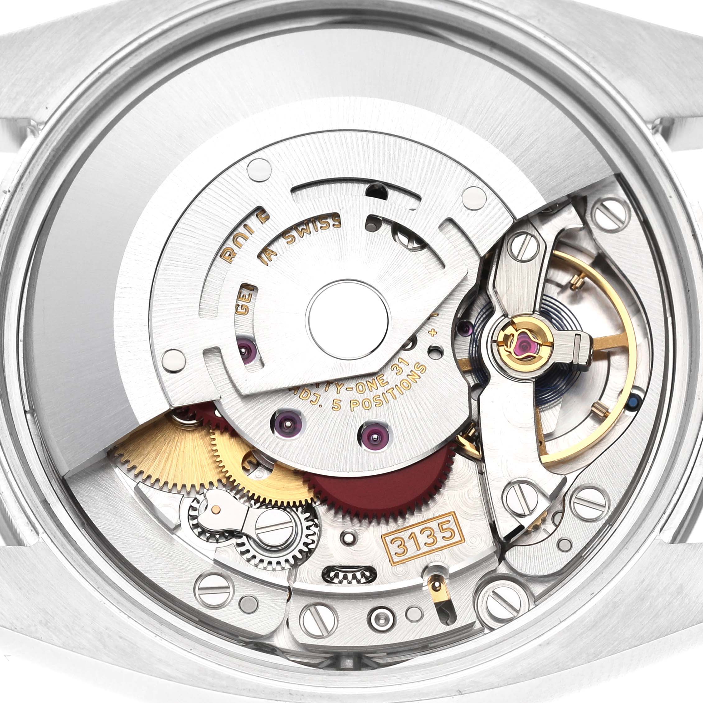 This image shows a close-up of the internal mechanism of the Rolex Date 115234 Men's Stainless Steel Black Dial 115234 Men's Stainless Steel Black Dial, focusing on the movement parts.