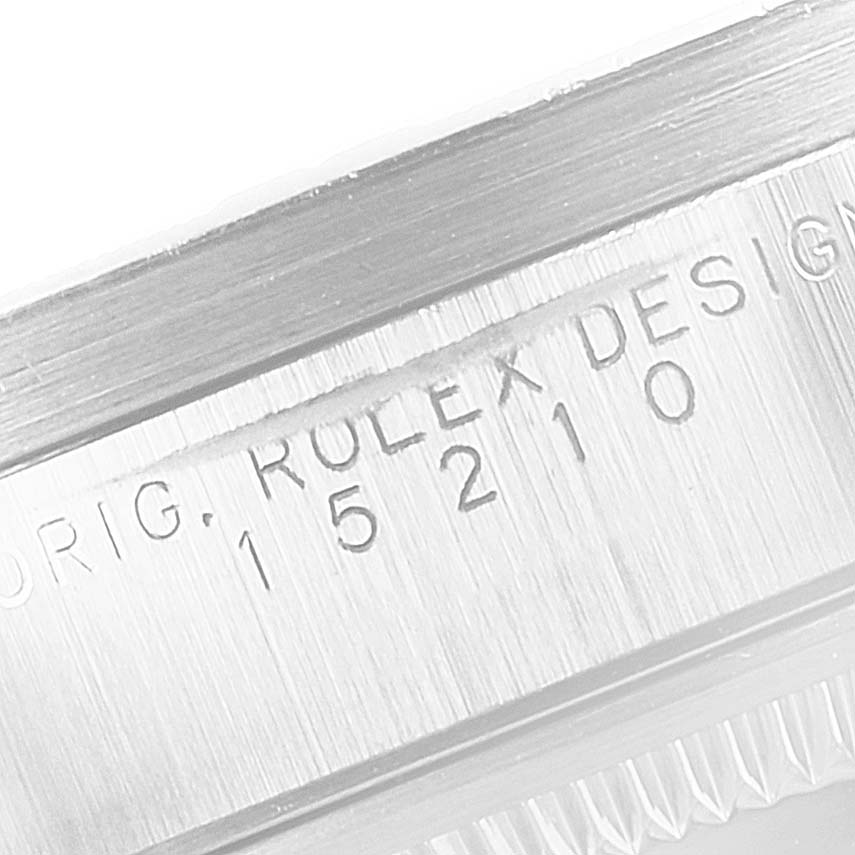 This image shows a close-up of the model number engraving on the side of a Rolex Date 15210 Men's Stainless Steel Blue Dial 15210 Men's Stainless Steel Blue Dial watch.