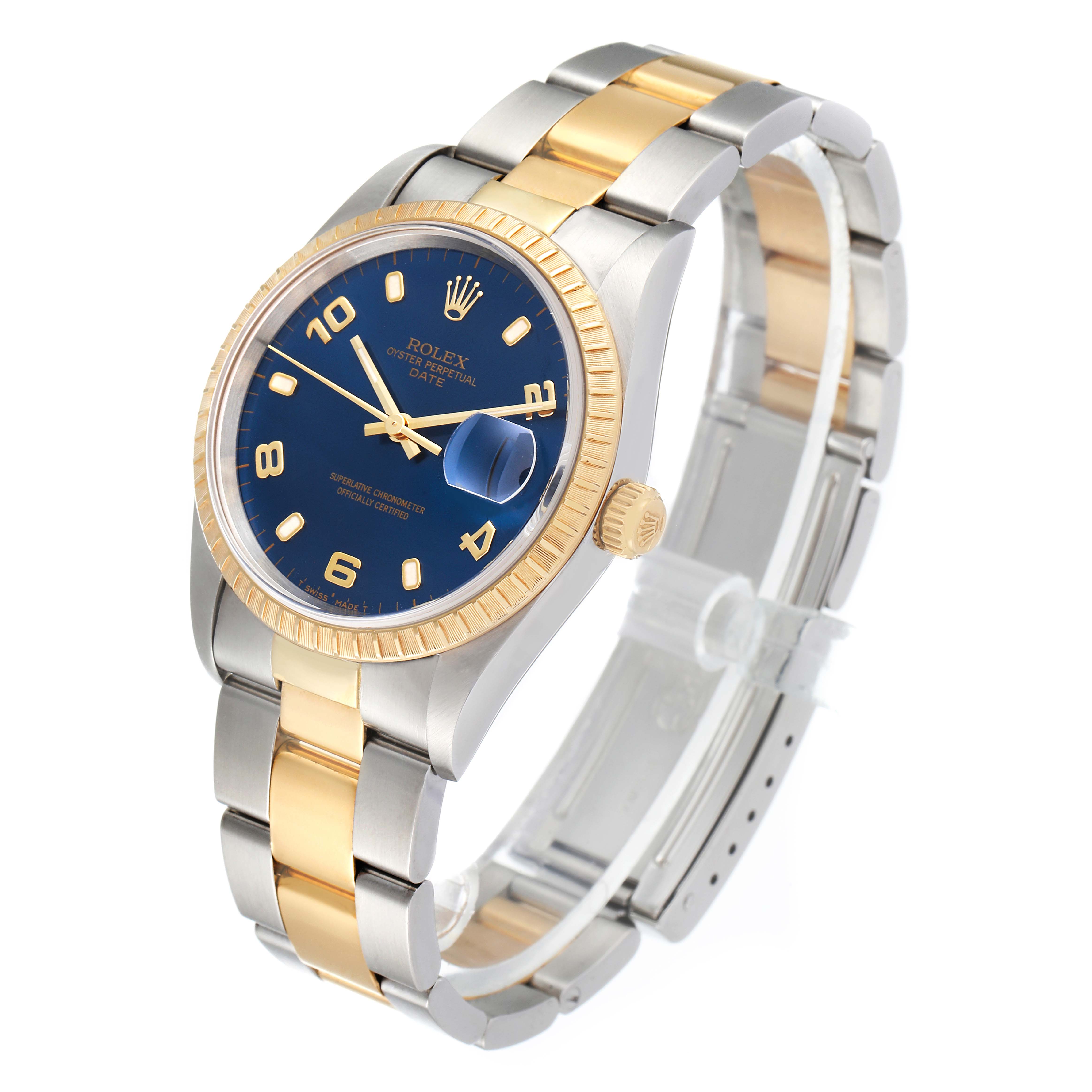 The image shows a Rolex Date 15223 Men's Steel and Gold (two tone) Blue Dial 15223 Men's Steel and Gold (two tone) Blue Dial watch at an angled view, highlighting its blue dial, two-tone bracelet, and fluted bezel.