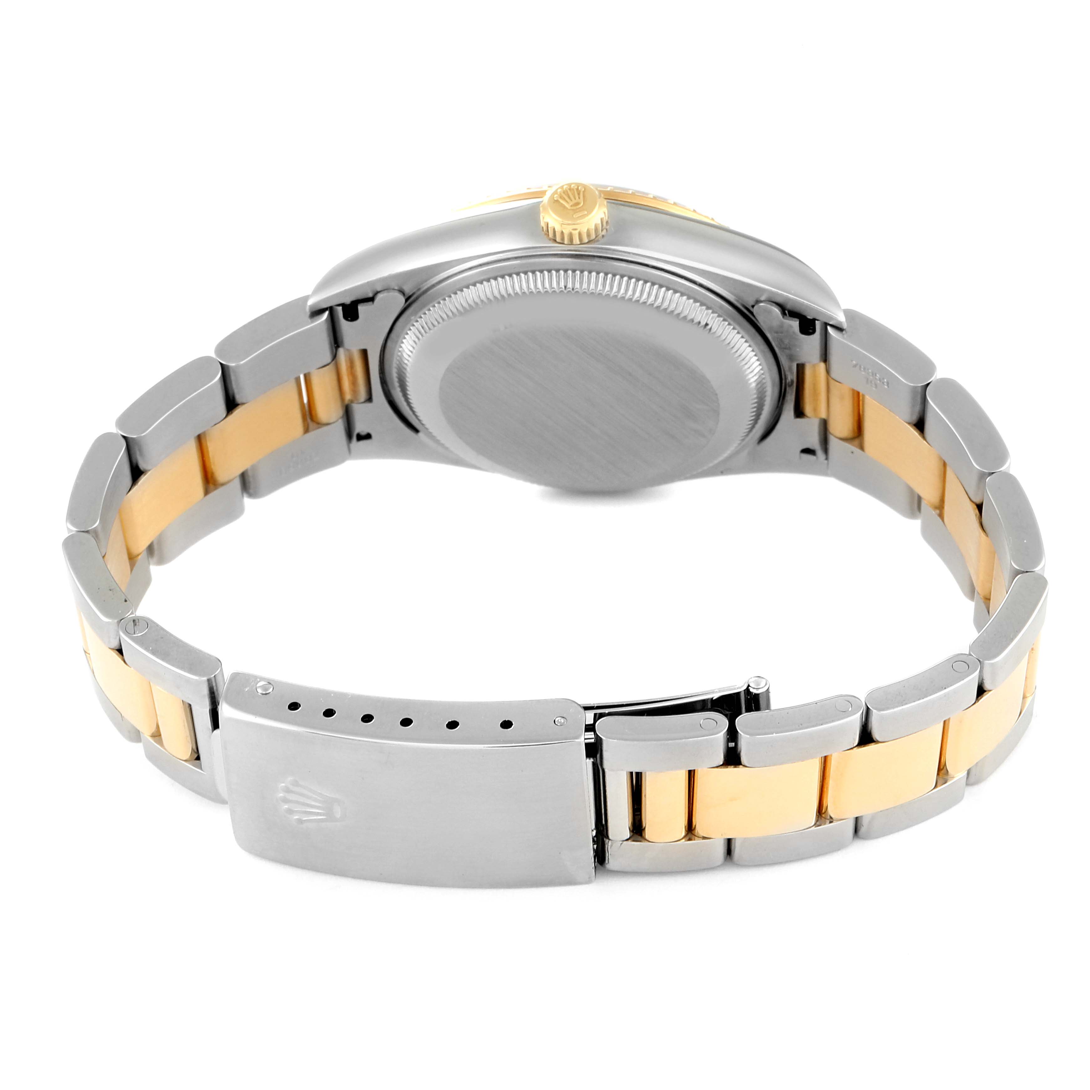 This image shows the back view of a Rolex Date 15223 Men's Steel and Gold (two tone) Blue Dial 15223 Men's Steel and Gold (two tone) Blue Dial watch, focusing on the case back, crown, and two-tone bracelet with a clasp.