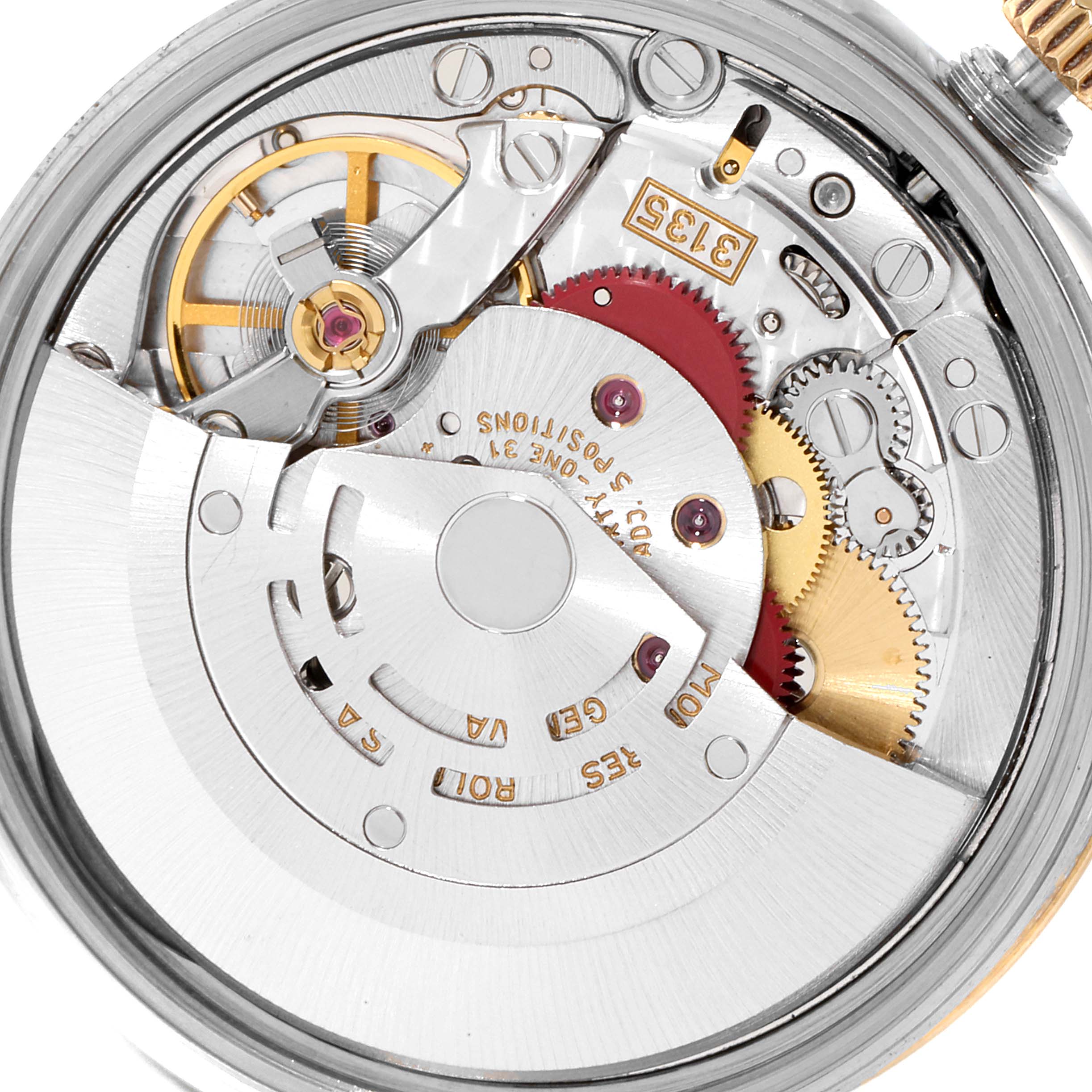 This image shows the internal mechanism of a Rolex Date 15223 Men's Steel and Gold (two tone) Blue Dial 15223 Men's Steel and Gold (two tone) Blue Dial model watch from a close-up, showcasing its intricate gears and components.