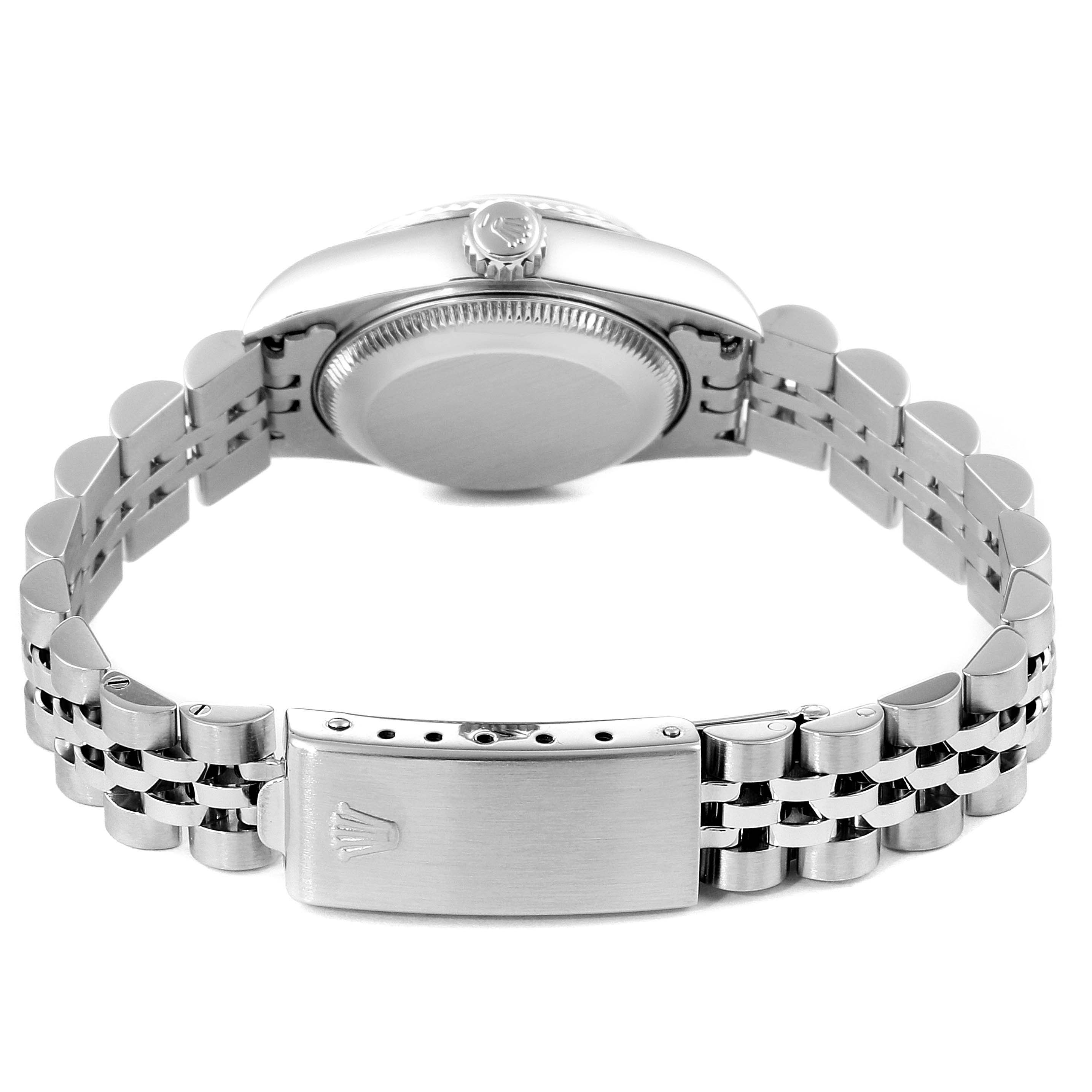 This image shows the back of a Rolex Datejust 69174 Women
s Stainless Steel White Dial 69174 Women
s Stainless Steel White Dial watch, including its clasp and part of the bracelet.