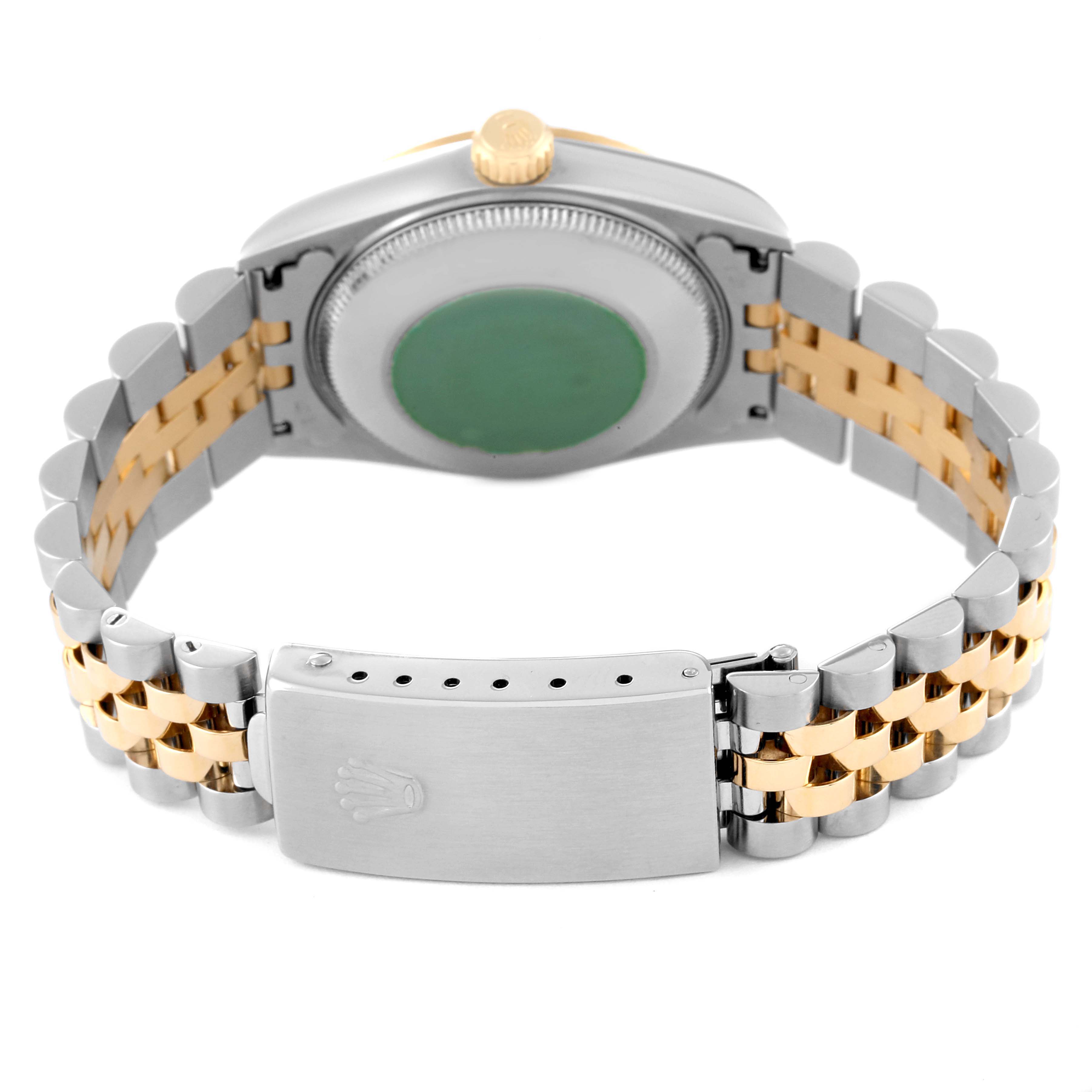 This image shows the back and clasp of a Rolex Mid-Size 68273 Women
s Steel and Gold (two tone) White Dial 68273 Women
s Steel and Gold (two tone) White Dial model watch, highlighting its two-tone bracelet and caseback.