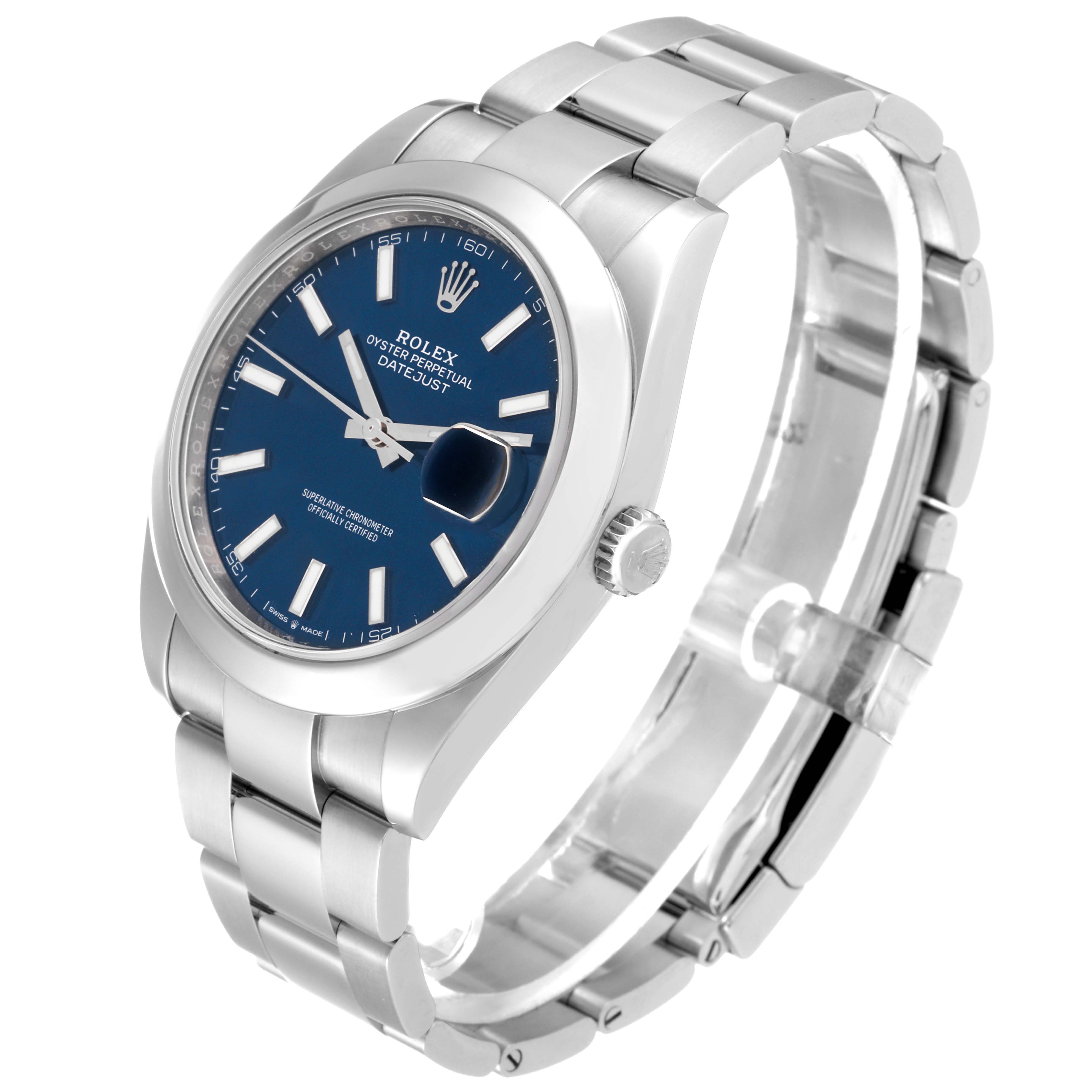 This image shows a Rolex Datejust 41 126300 Men
s Stainless Steel Blue Dial 126300 Men
s Stainless Steel Blue Dial watch at an angled side view, highlighting its blue dial, casing, and metal bracelet.