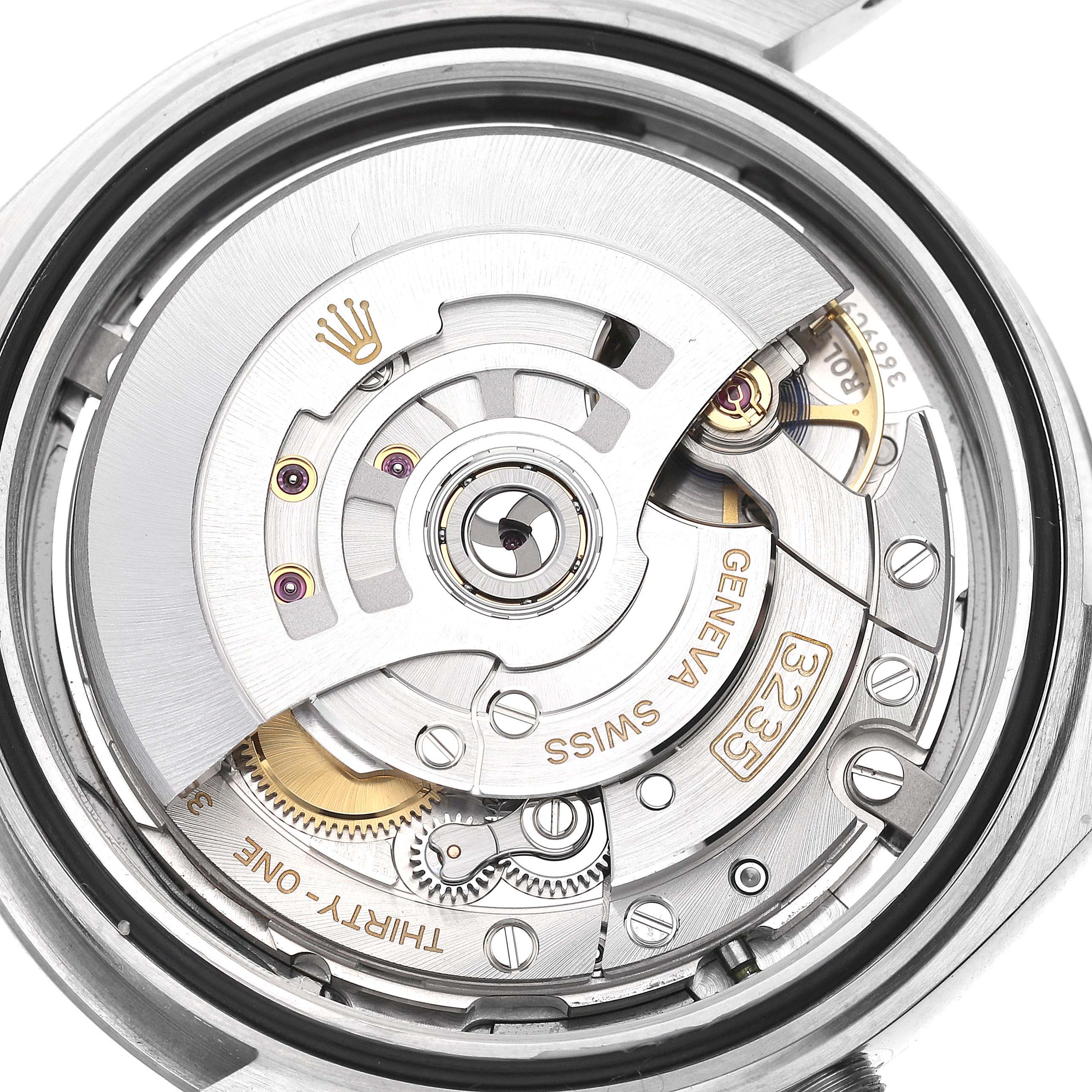 The image shows the inner mechanical movement of the Rolex Datejust 41 126300 Men
s Stainless Steel Blue Dial 126300 Men
s Stainless Steel Blue Dial watch.