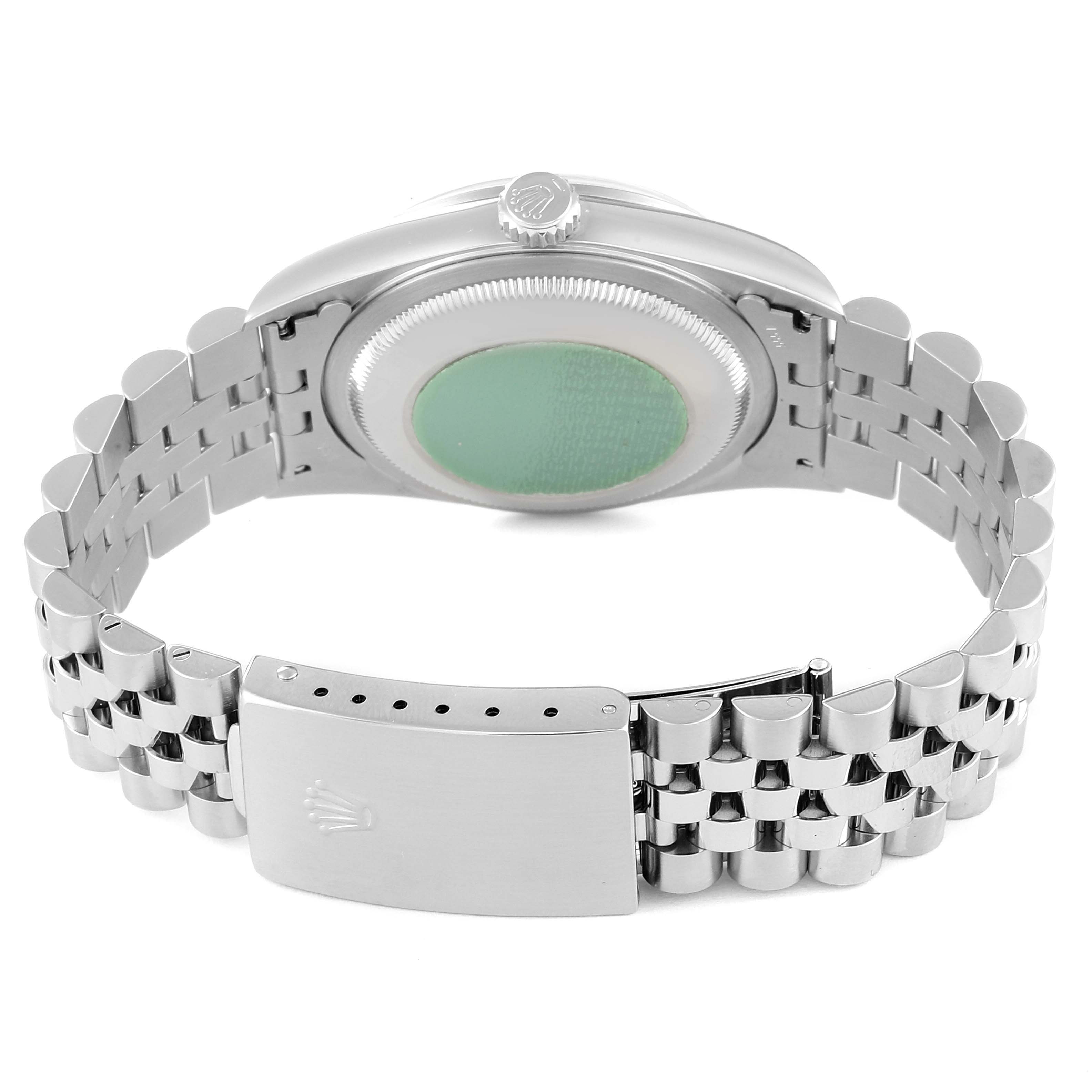 This image shows the back side of a Rolex Datejust 16200 Men's Stainless Steel Silver Dial 16200 Men's Stainless Steel Silver Dial watch, focusing on the case back and the Jubilee bracelet with the clasp.