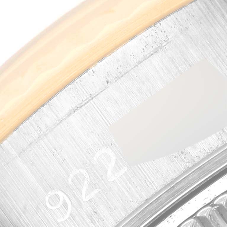 The image shows a close-up of the side bezel and part of the case of a Rolex Datejust 69173 Women's Steel and Gold (two tone) Champagne Dial 69173 Women's Steel and Gold (two tone) Champagne Dial watch, highlighting part of its serial number.