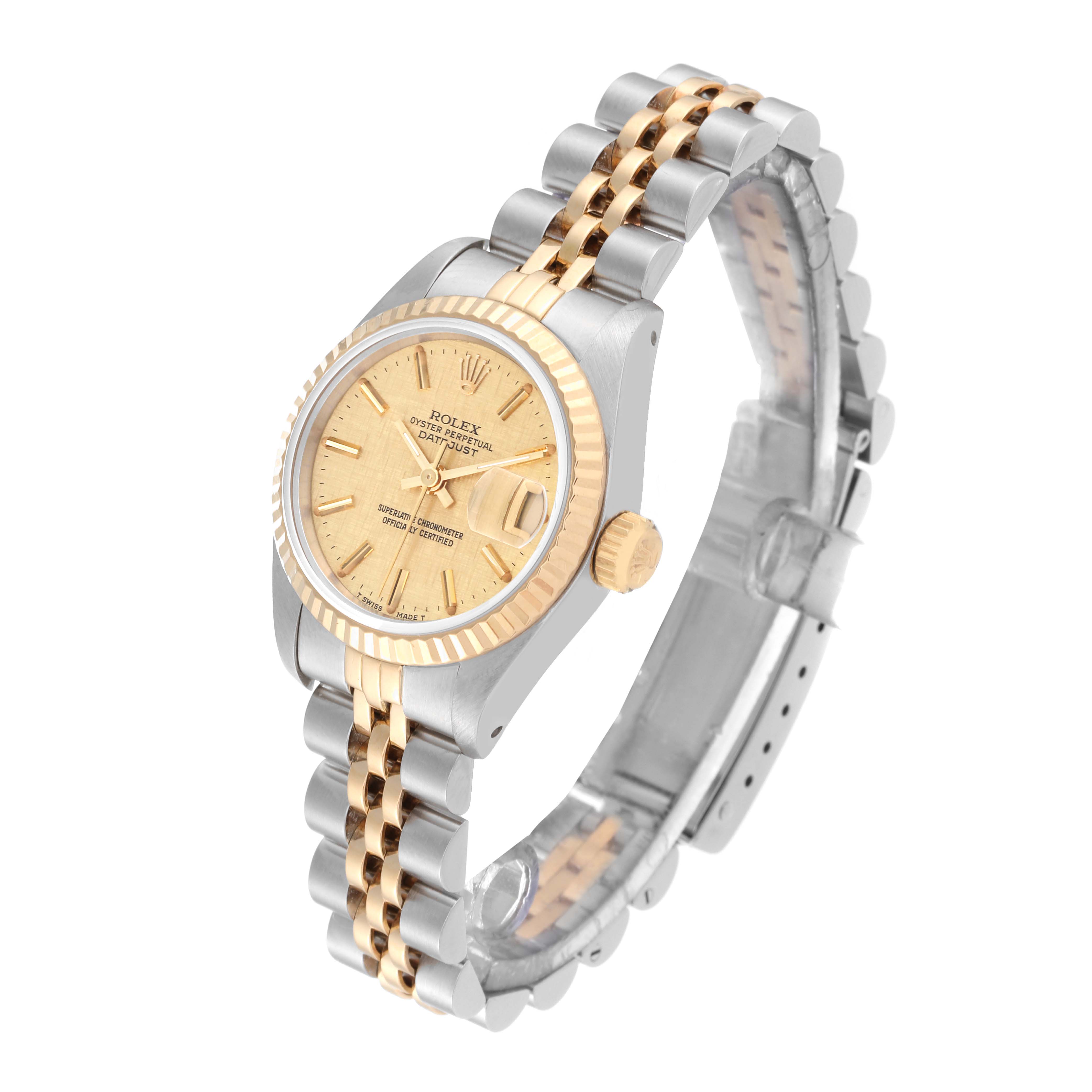 The Rolex Datejust 69173 Women's Steel and Gold (two tone) Champagne Dial 69173 Women's Steel and Gold (two tone) Champagne Dial watch is shown at a three-quarter angle, displaying the face, bezel, crown, and part of the bracelet.