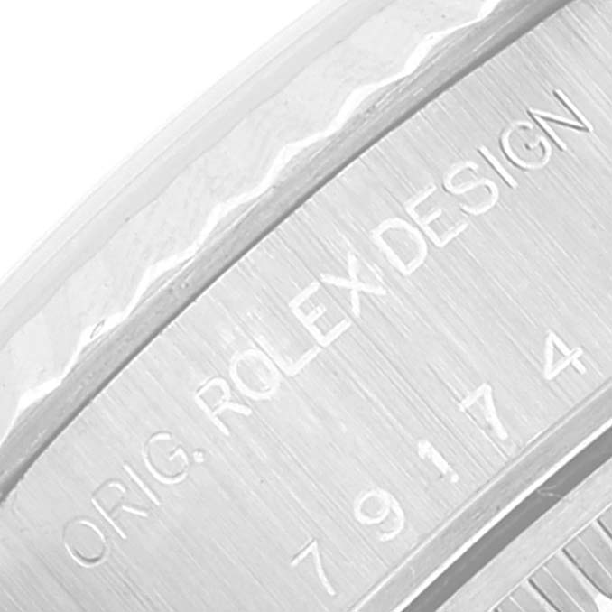 This image shows a close-up of the side engraving on the Datejust model by Rolex, featuring the text "ORIG. ROLEX DESIGN."
