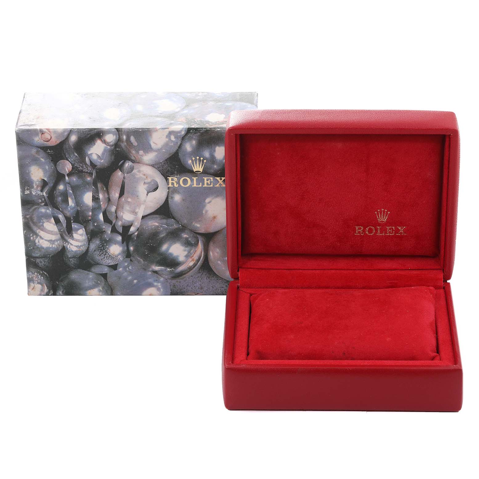 This open red case for the Rolex Datejust 79174 Women's Stainless Steel Mother of Pearl Dial 79174 Women's Stainless Steel Mother of Pearl Dial watch is displayed with an accompanying outer box.