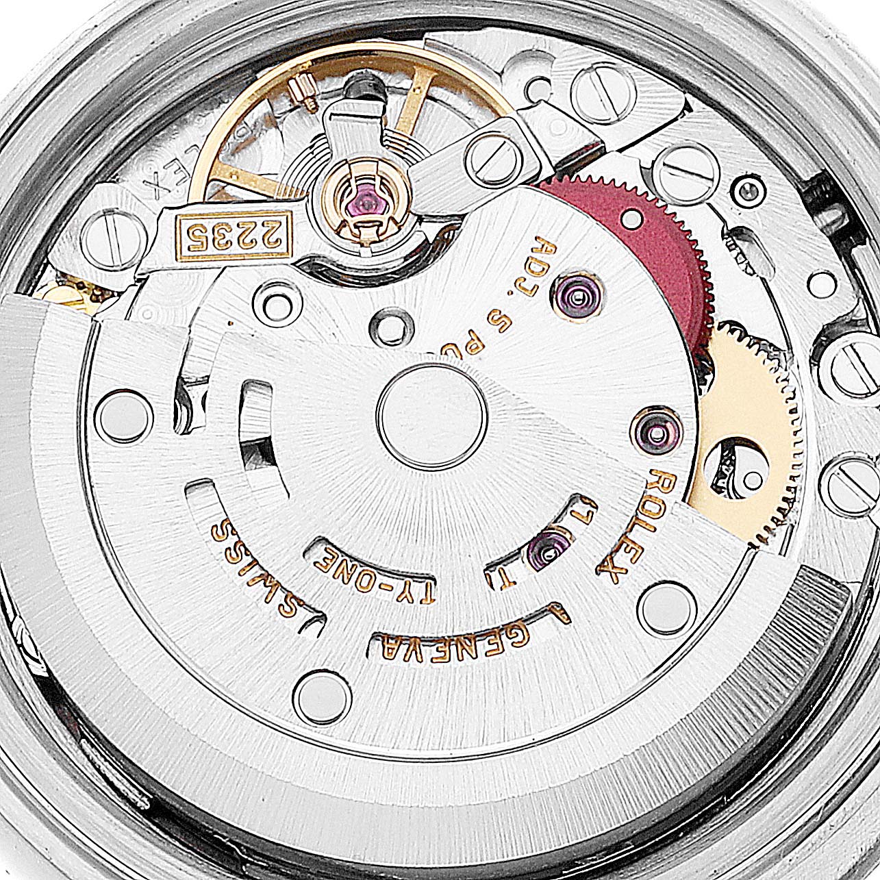 This image shows a close-up of the internal mechanism of a Rolex Datejust 79174 Women's Stainless Steel Mother of Pearl Dial 79174 Women's Stainless Steel Mother of Pearl Dial watch, highlighting its intricate components and gears.