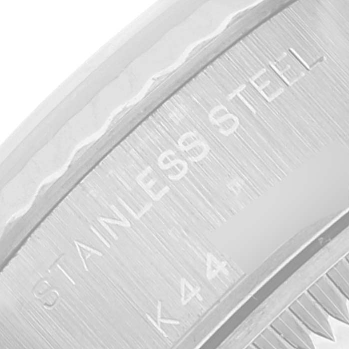 Close-up of the case back and edge engravings of a Rolex Datejust 79174 Women's Stainless Steel Mother of Pearl Dial 79174 Women's Stainless Steel Mother of Pearl Dial, showing "STAINLESS STEEL" inscription.