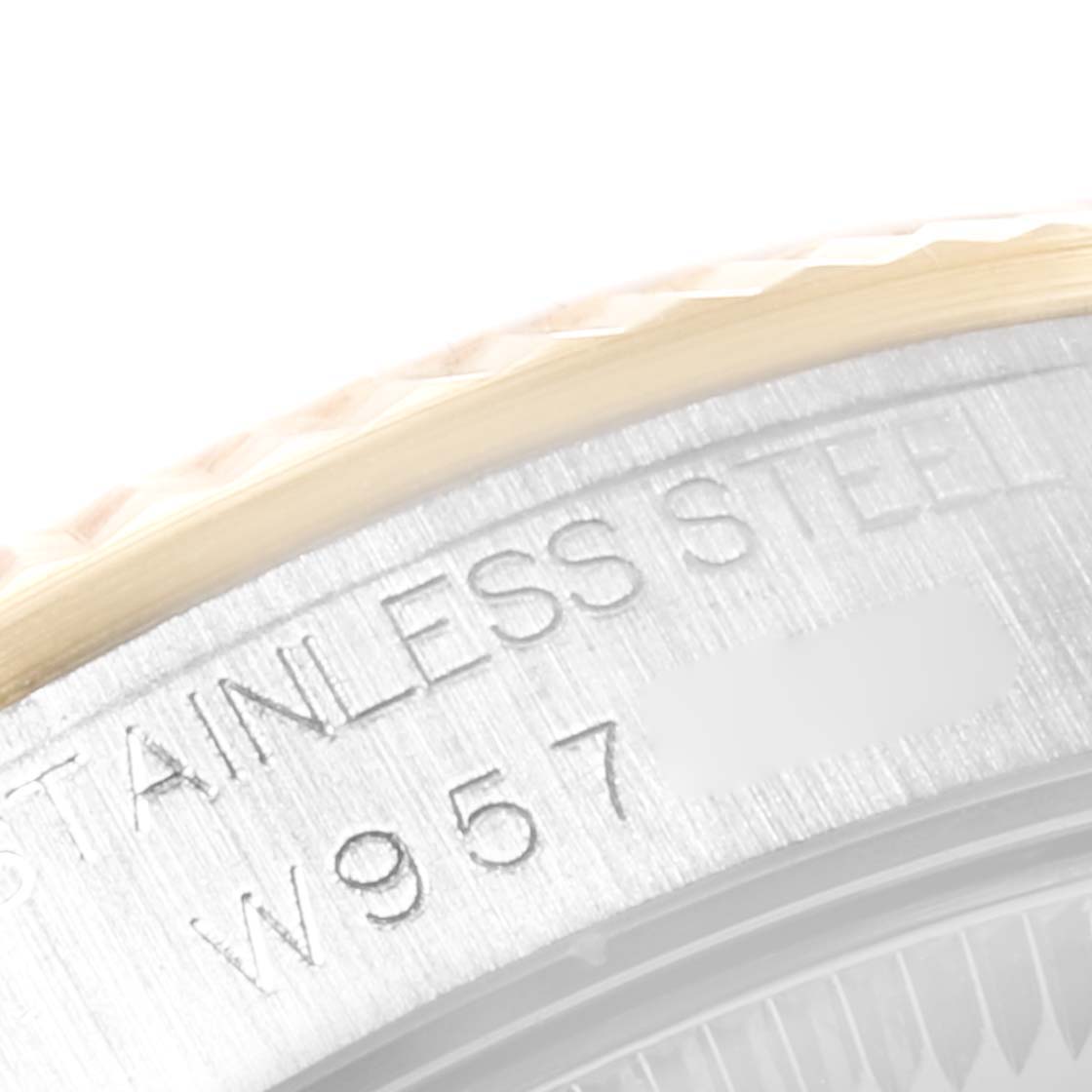 This image shows a close-up of the engraving on the stainless steel casing of a Rolex Mid-Size 68273 Women
s Steel and Gold (two tone) Champagne Dial 68273 Women
s Steel and Gold (two tone) Champagne Dial watch.