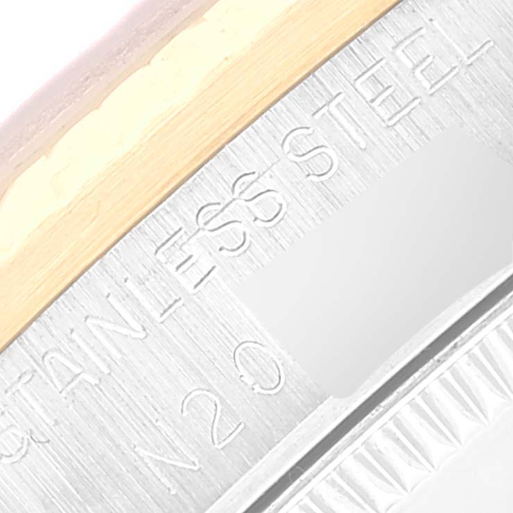 Close-up of the case side for a Rolex Mid-Size 68273 Women
s Steel and Gold (two tone) Silver Dial 68273 Women
s Steel and Gold (two tone) Silver Dial watch showing "STAINLESS STEEL" engraving.