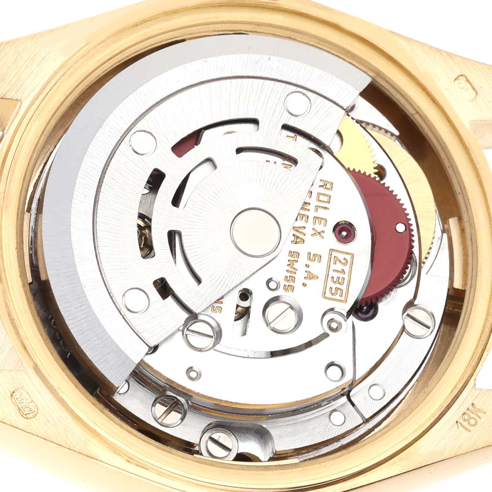 The image shows the internal mechanism and movement of a Rolex President 69178 Women
s Yellow Gold Champagne Dial 69178 Women
s Yellow Gold Champagne Dial model watch viewed from the back.