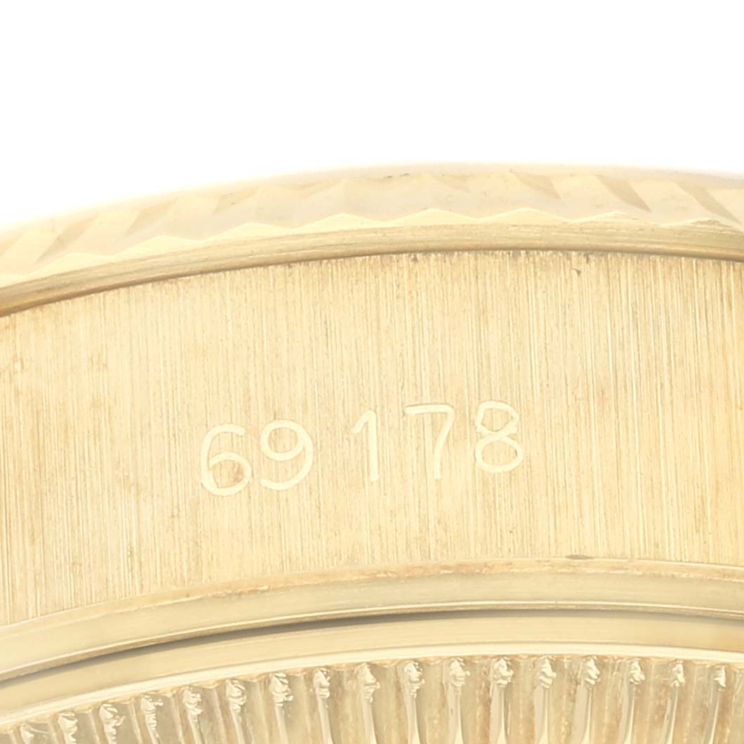 The image shows a close-up of the side of a Rolex President 69178G Women's Yellow Gold Champagne Dial 69178G Women's Yellow Gold Champagne Dial model watch displaying the model number 69178 on the casing.