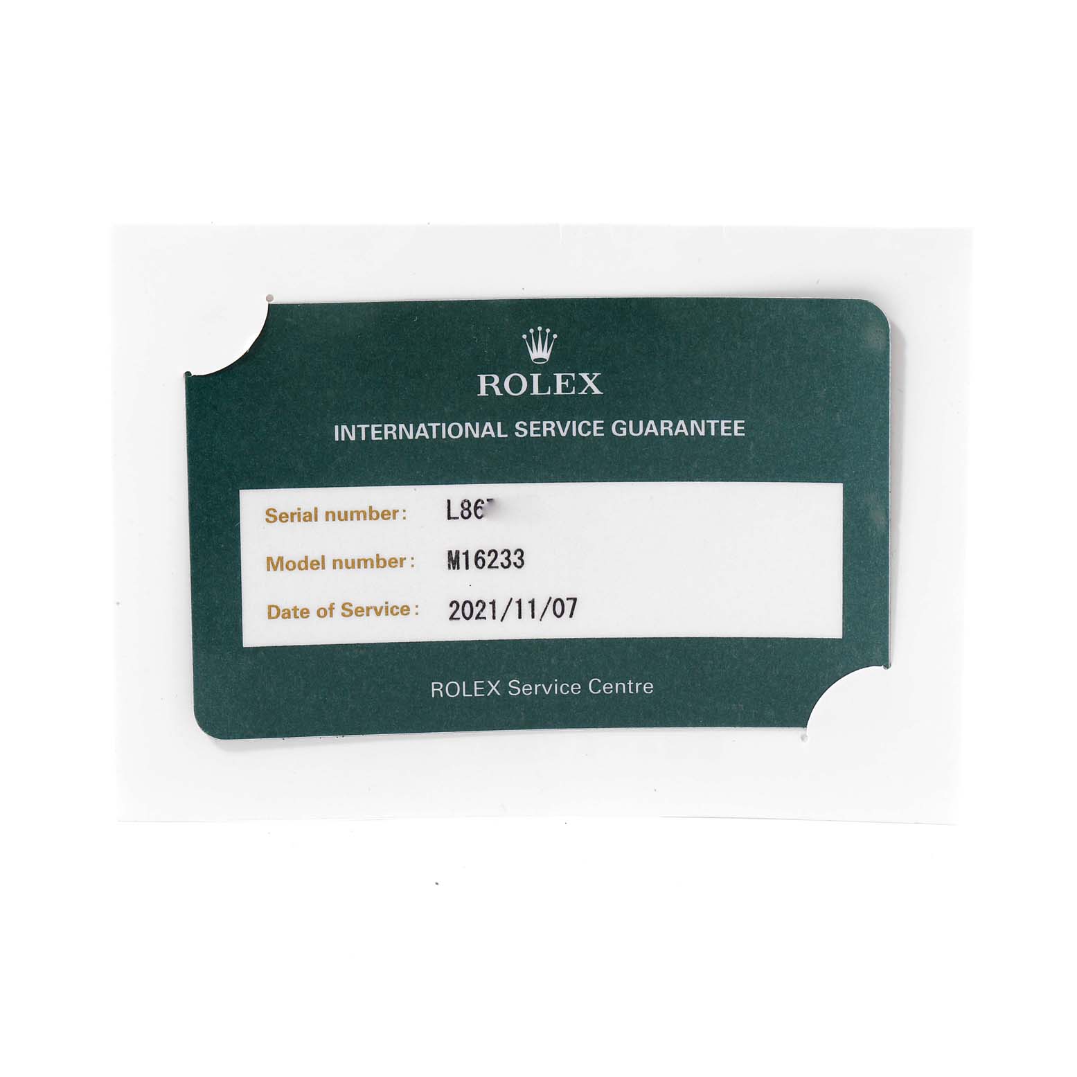 This is an image of a Rolex International Service Guarantee card for a Datejust model M16233.