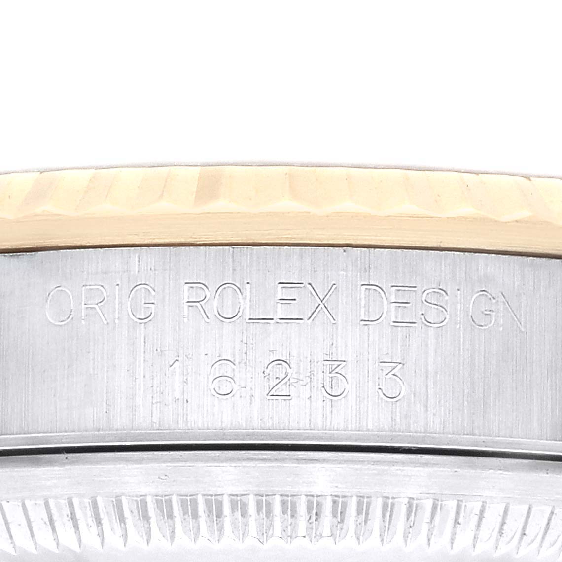 This image shows a close-up of the case side engraving on a Rolex Datejust 16233 Men's Steel and Gold (two tone) Champagne Dial 16233 Men's Steel and Gold (two tone) Champagne Dial watch.