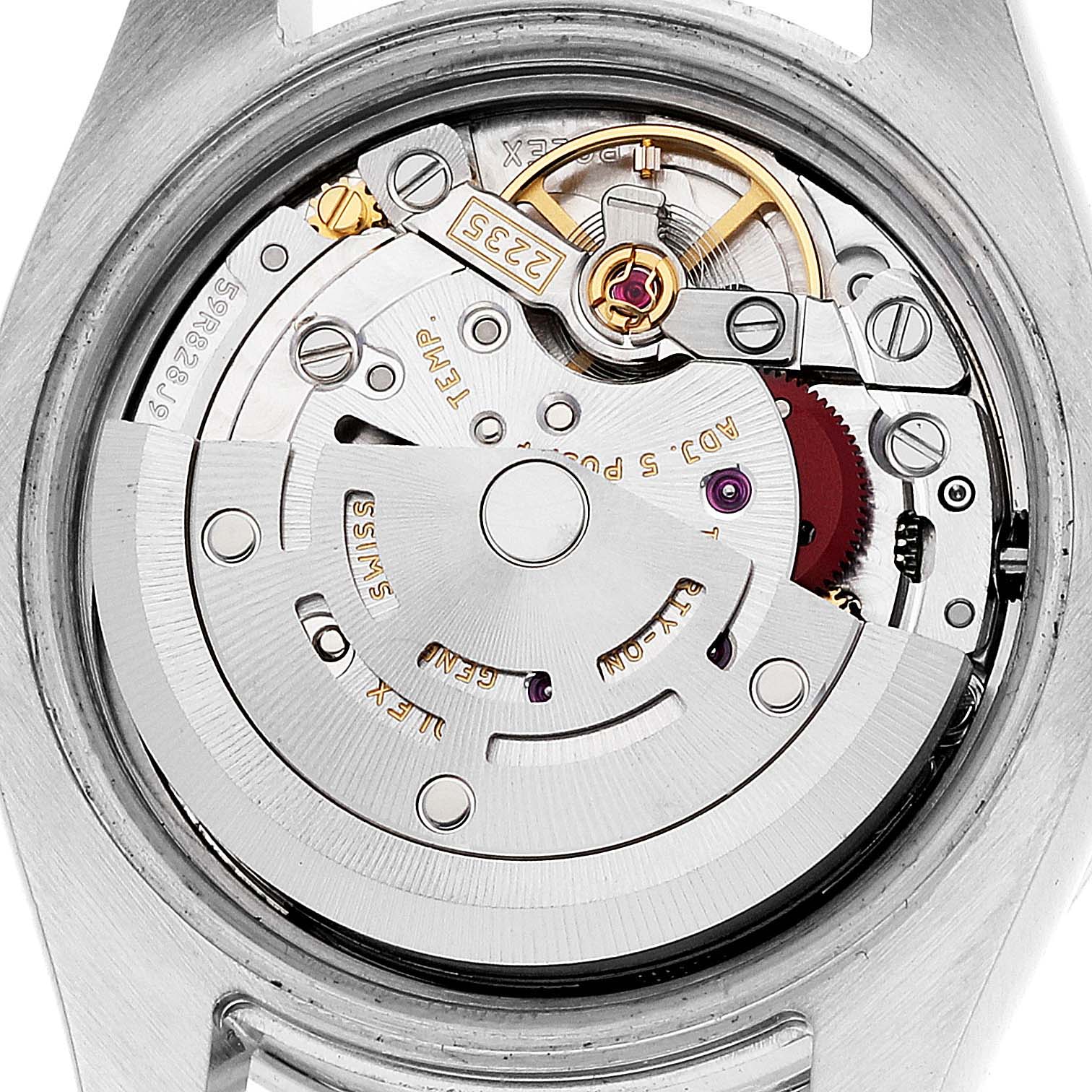 This image shows a detailed close-up of the movement and internal mechanisms of a Rolex Datejust 179384 Women's Stainless Steel Pink Dial 179384 Women's Stainless Steel Pink Dial watch.