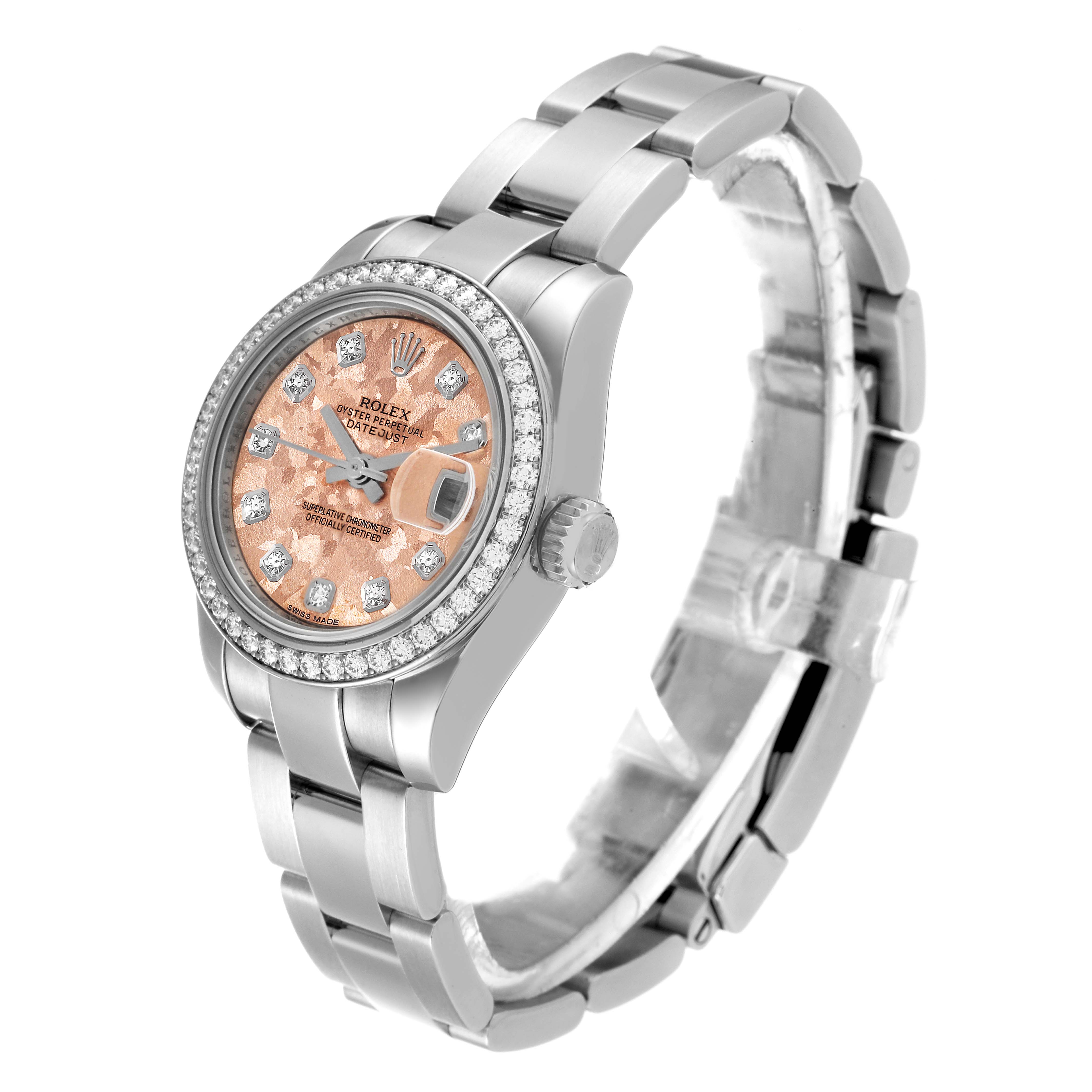 The Rolex Datejust 179384 Women's Stainless Steel Pink Dial 179384 Women's Stainless Steel Pink Dial watch is shown at a three-quarter angle, displaying its face, bezel, crown, and part of its bracelet.