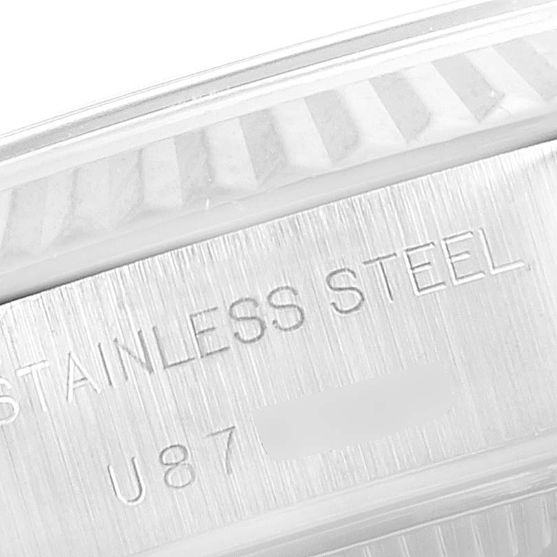 This image shows a close-up angle of the stainless steel part with the engraved marking on the Rolex Datejust 69174 Women's Stainless Steel Mother of Pearl Dial 69174 Women's Stainless Steel Mother of Pearl Dial watch.