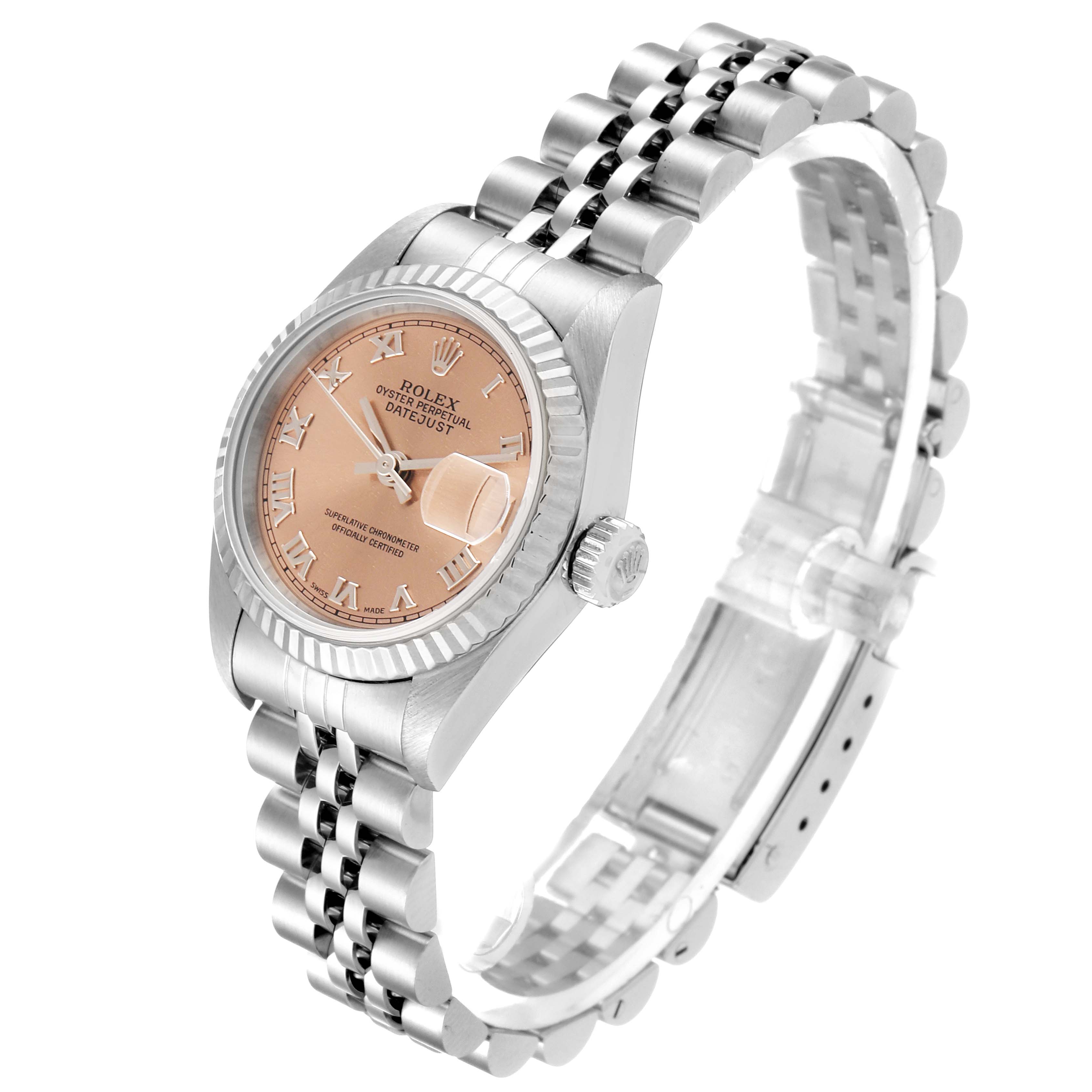 The image shows a Rolex Datejust 69174 Women's Stainless Steel Pink Dial 69174 Women's Stainless Steel Pink Dial watch from an angled front view, highlighting its face, fluted bezel, crown, and Jubilee bracelet.