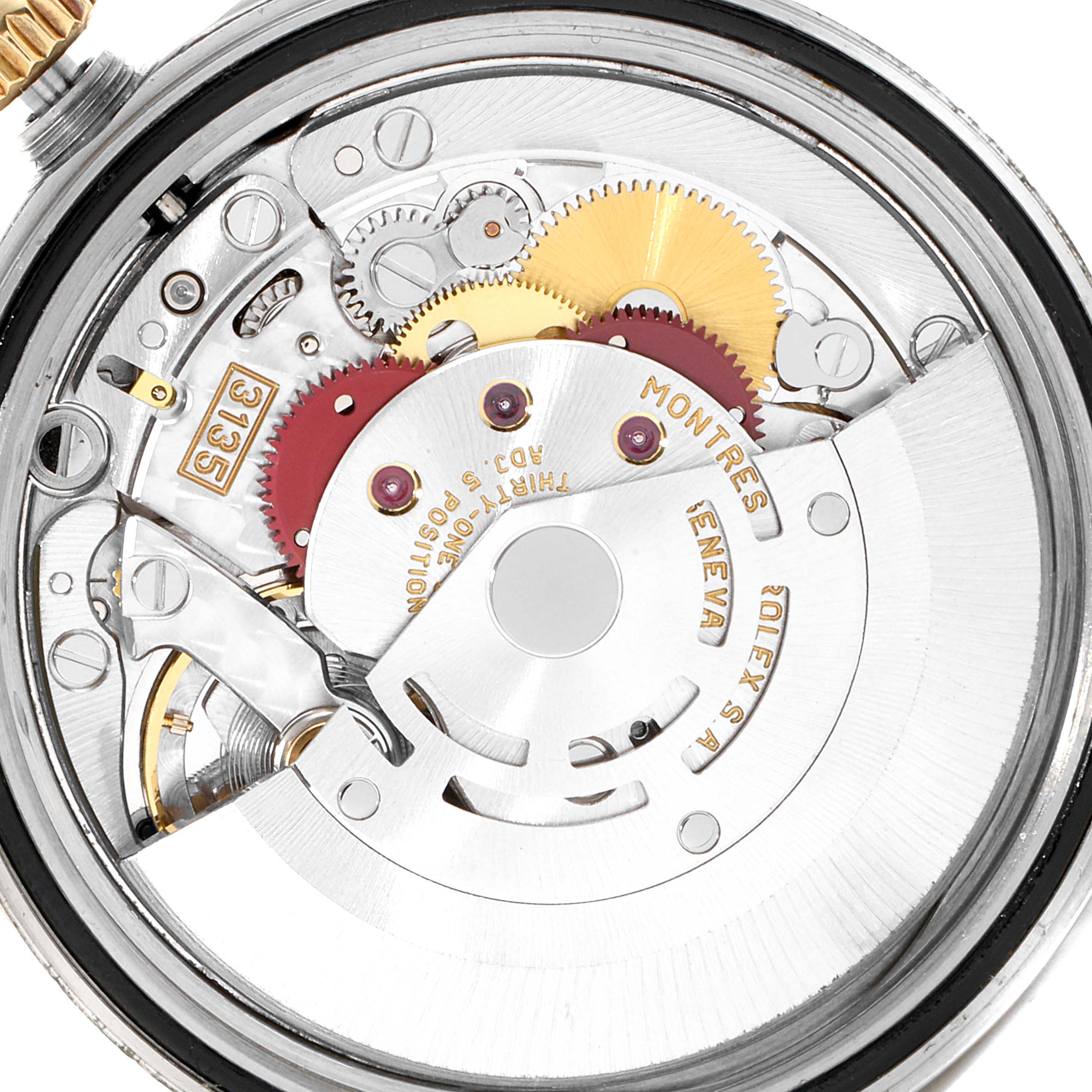 The image shows an internal view of a Rolex Datejust 16233 Men's Steel and Gold (two tone) Black Dial 16233 Men's Steel and Gold (two tone) Black Dial watch movement, highlighting gears and components.