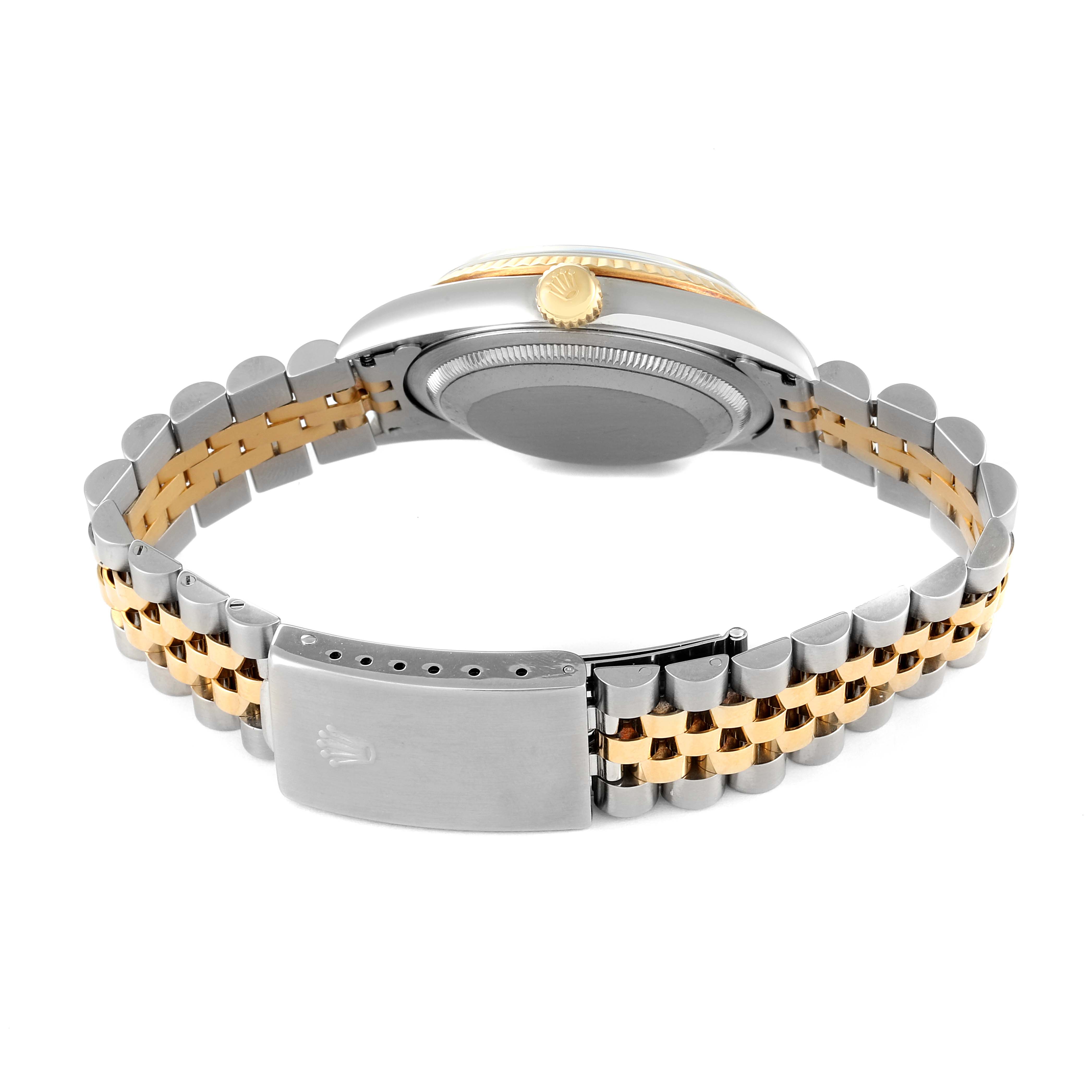 This image shows the back view of a Rolex Datejust 16233 Men's Steel and Gold (two tone) Black Dial 16233 Men's Steel and Gold (two tone) Black Dial watch, highlighting its case, crown, and two-tone bracelet.