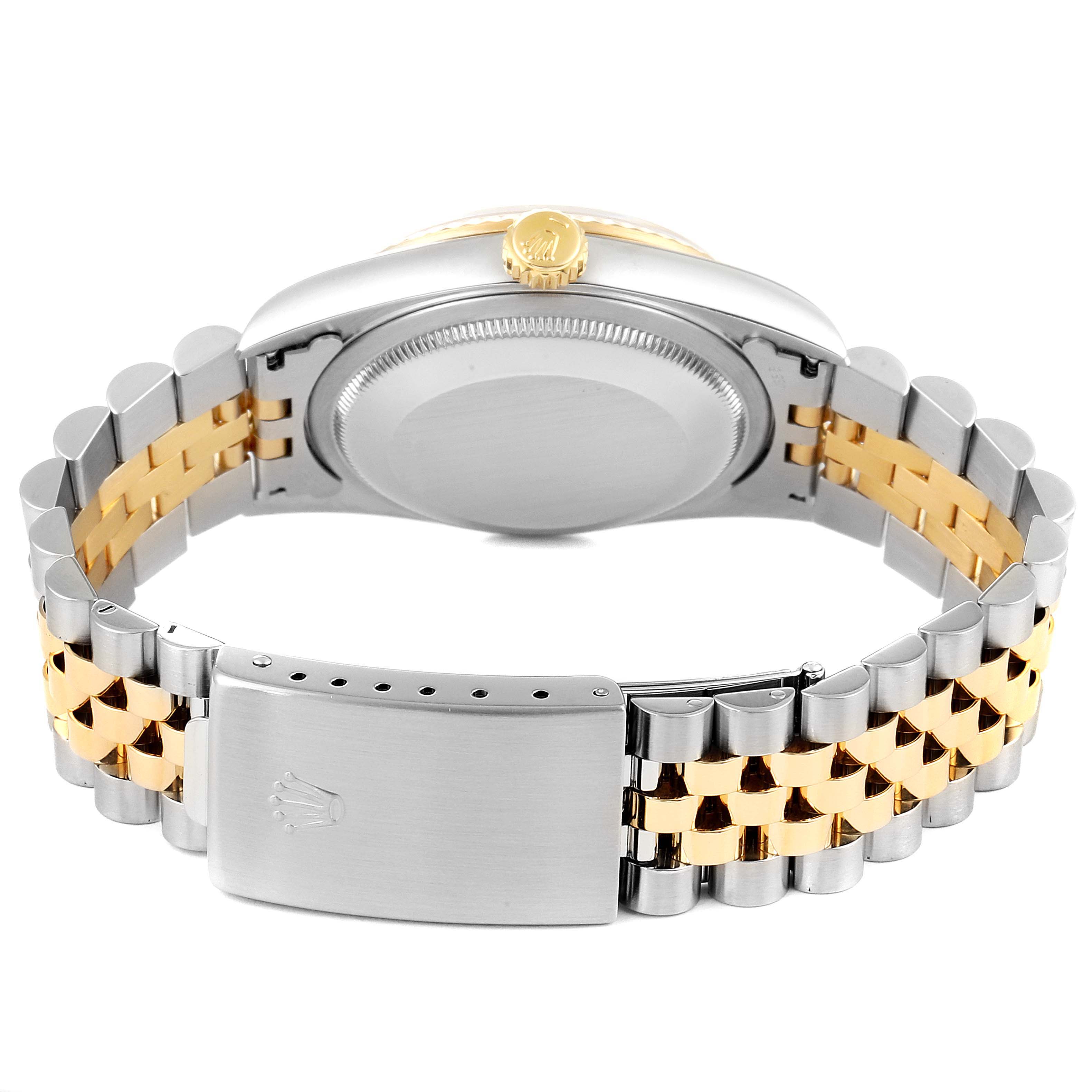 The image shows the back and bracelet of the Rolex Datejust 16233 Men's Steel and Gold (two tone) Silver Dial 16233 Men's Steel and Gold (two tone) Silver Dial watch, highlighting its two-tone metal design.