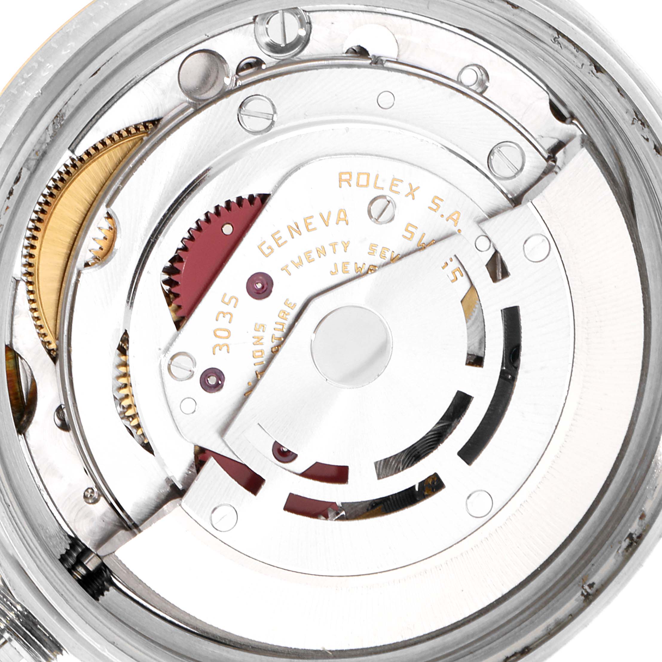 This image shows a close-up view of the movement mechanism of a Rolex Datejust 16013 Men's Steel and Gold (two tone) Silver Dial 16013 Men's Steel and Gold (two tone) Silver Dial watch.
