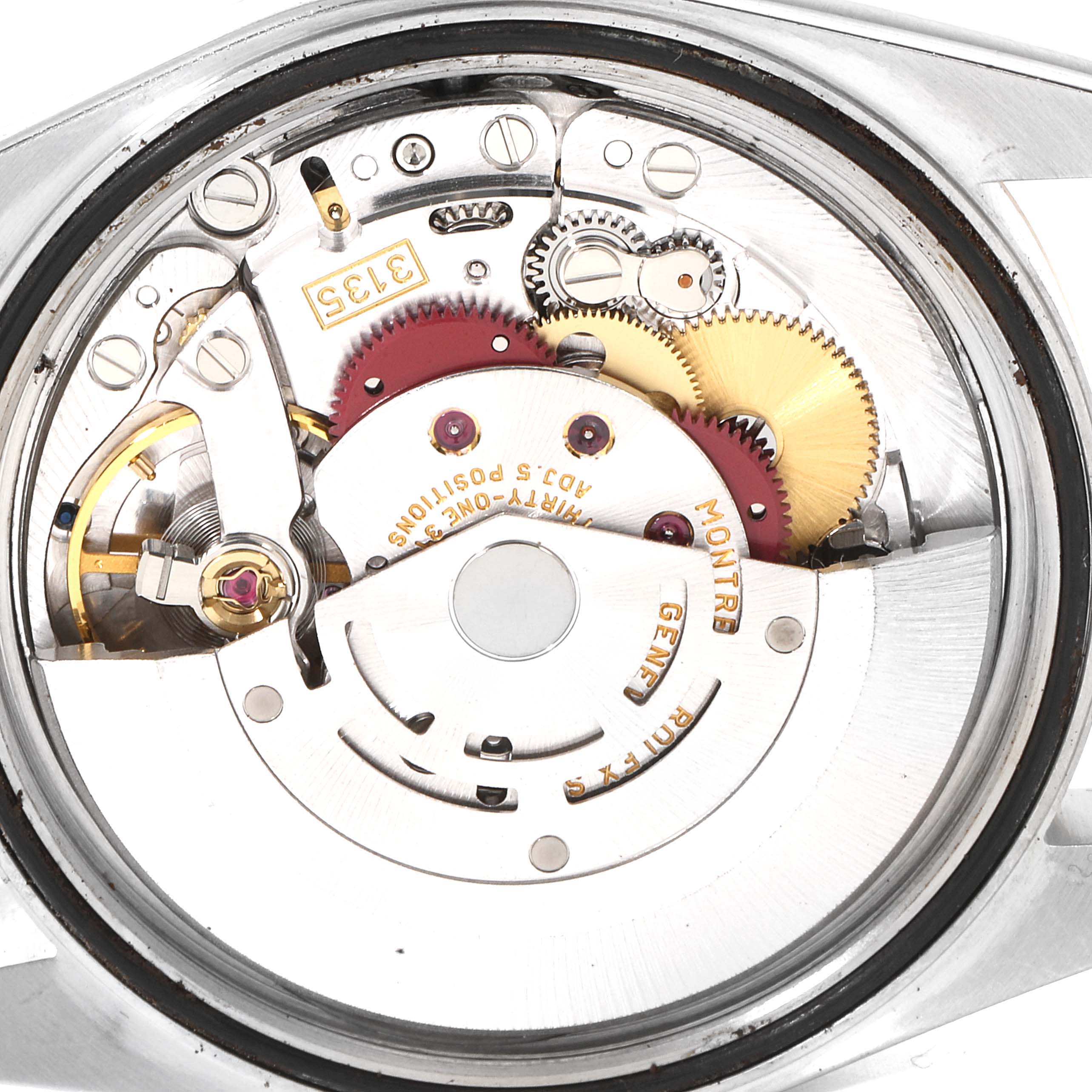 This image shows the inner mechanical components and movement of a Rolex Datejust 16233 Men's Steel and Gold (two tone) White Dial 16233 Men's Steel and Gold (two tone) White Dial watch from a back view angle.
