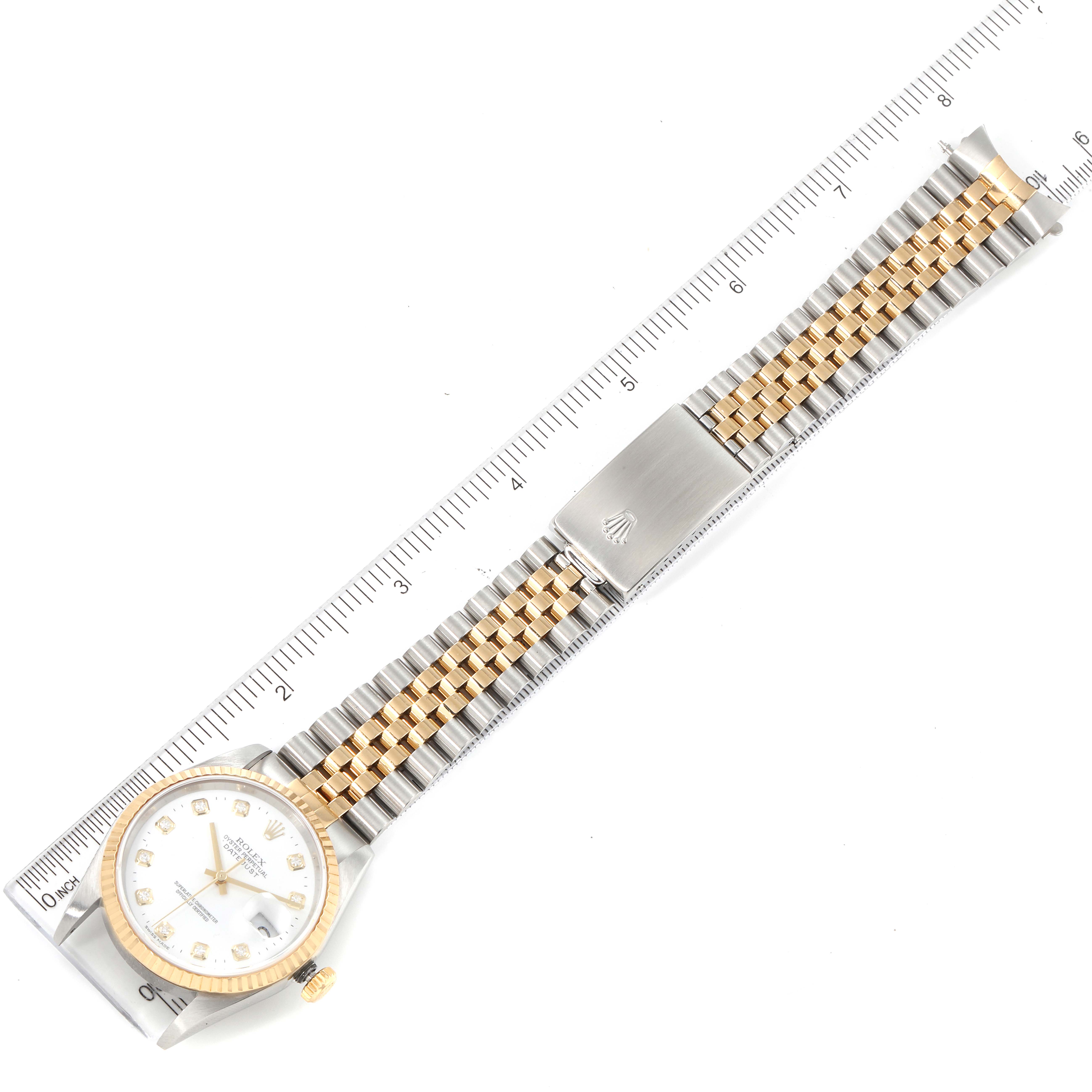 The image shows a top view of a Rolex Datejust 16233 Men's Steel and Gold (two tone) White Dial 16233 Men's Steel and Gold (two tone) White Dial model watch, highlighting its face, bezel, bracelet, and clasp.