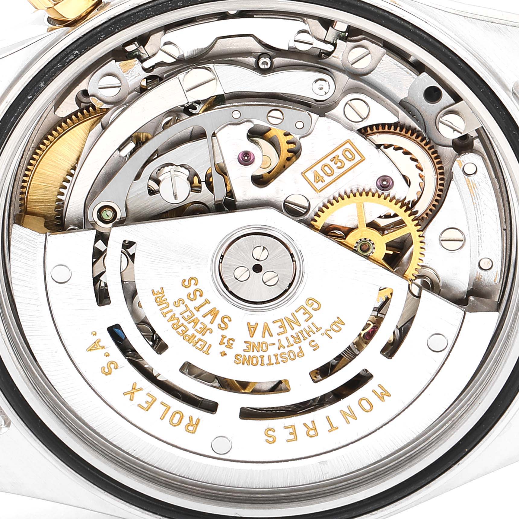 This image shows the intricate movement and internal mechanism of a Rolex Daytona 16523 Men's Steel and Gold (two tone) White Dial 16523 Men's Steel and Gold (two tone) White Dial watch.
