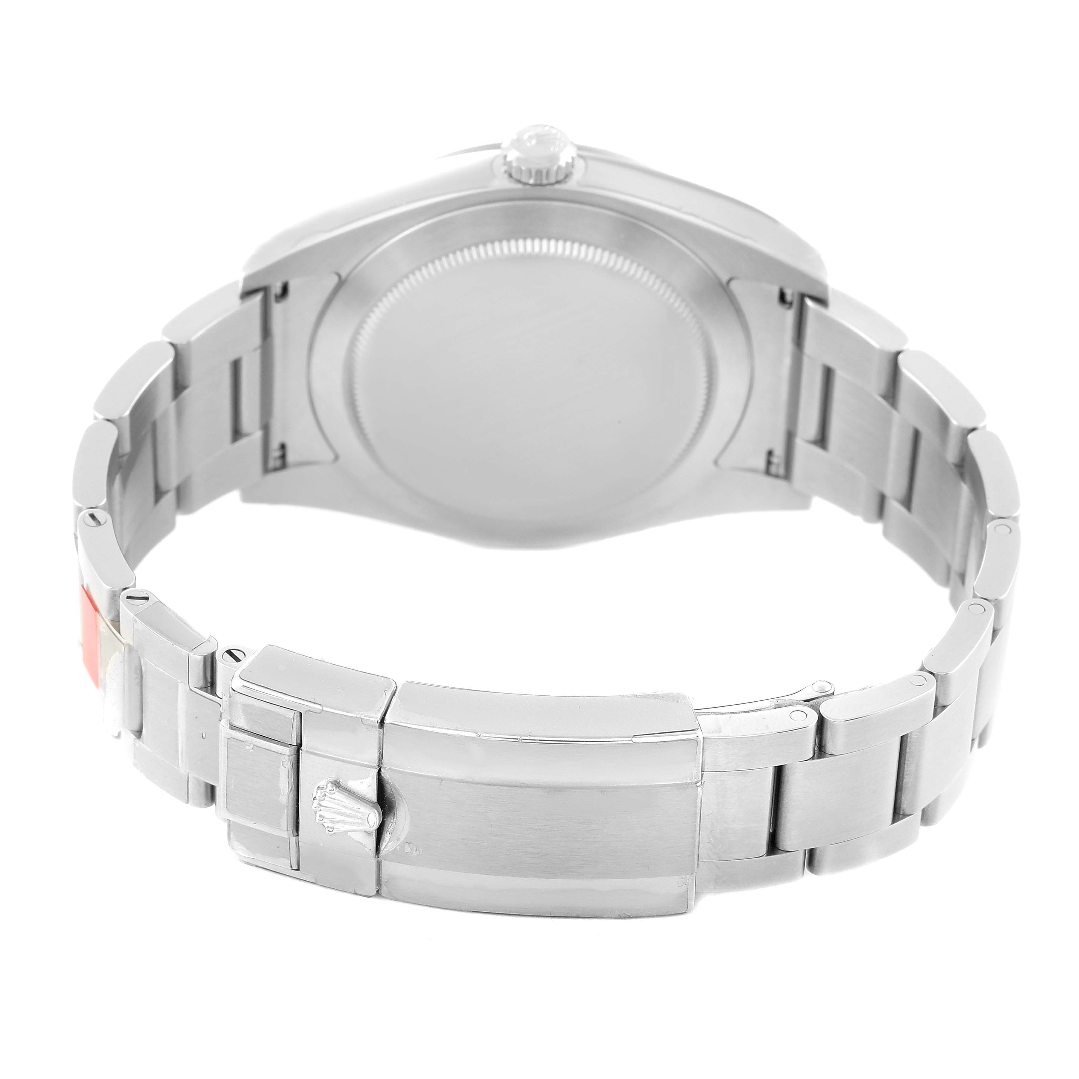 The image shows the back of a Rolex Explorer 214270 Men's Stainless Steel Black Dial 214270 Men's Stainless Steel Black Dial watch, highlighting its stainless steel case and bracelet clasp.