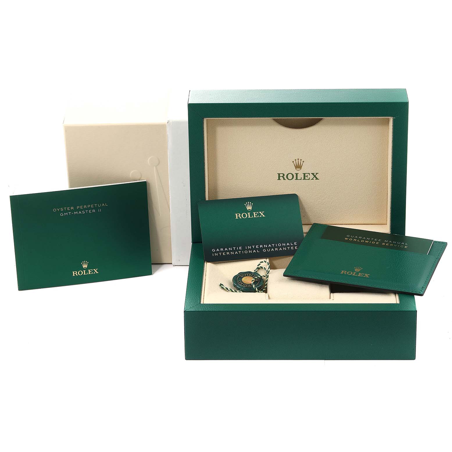 The image shows the packaging and documentation of a Rolex GMT-Master 126710 Men
s Stainless Steel Black Dial 126710 Men
s Stainless Steel Black Dial watch, including the box, manuals, and guarantee card.