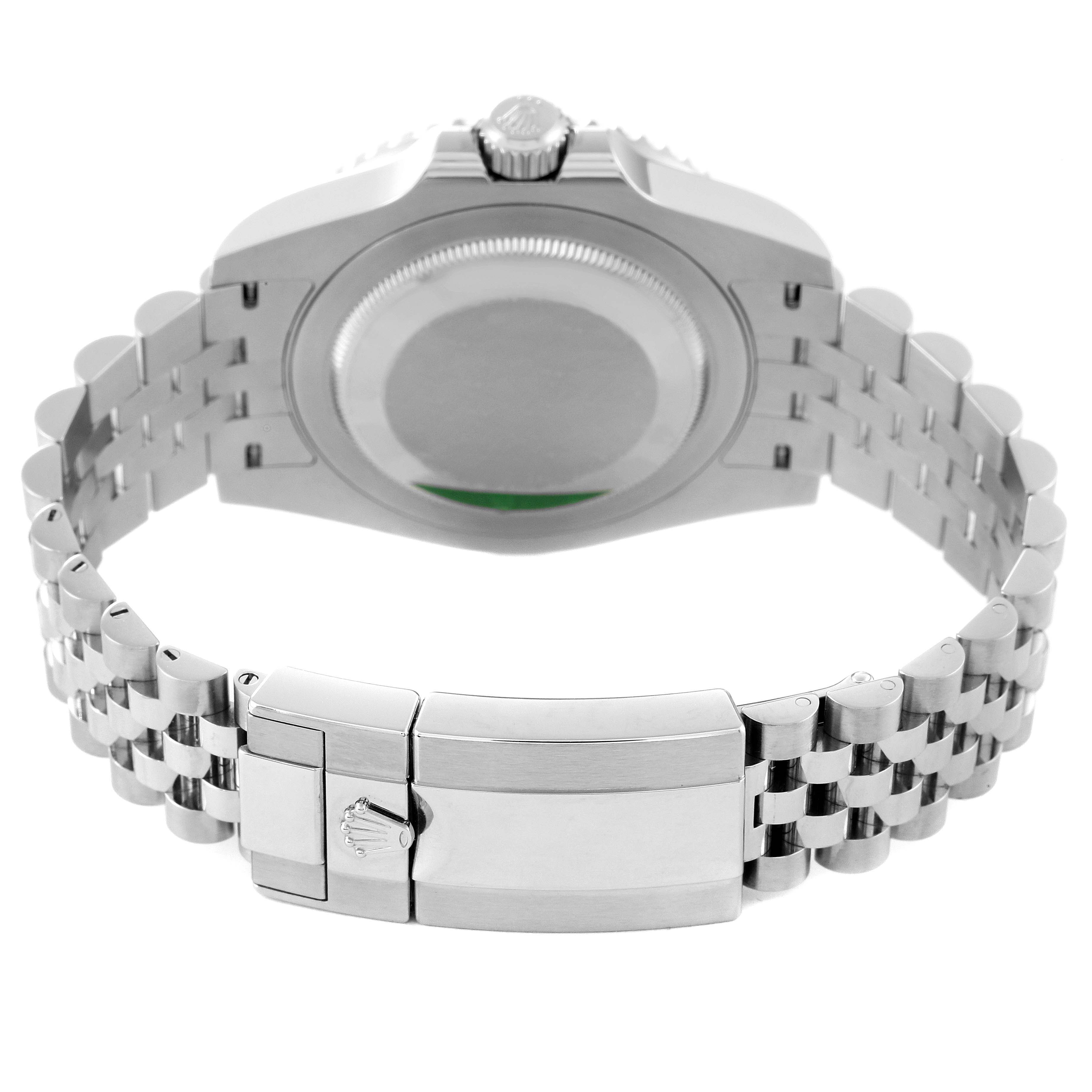 The image shows the back case and the clasp of the bracelet of a Rolex GMT-Master 126710 Men
s Stainless Steel Black Dial 126710 Men
s Stainless Steel Black Dial watch.