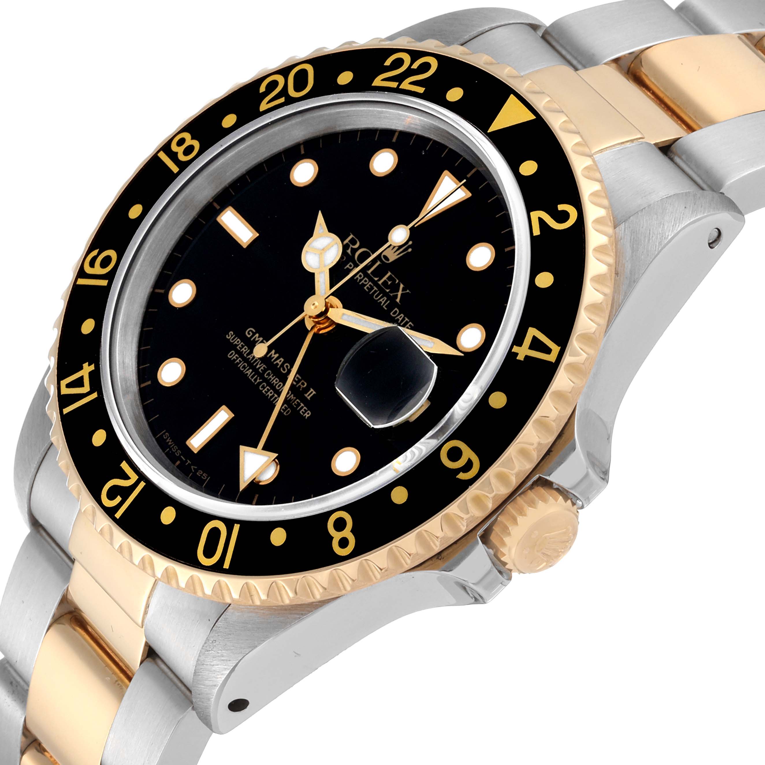 The image shows a Rolex GMT-Master 16713 Men's Steel and Gold (two tone) Black Dial 16713 Men's Steel and Gold (two tone) Black Dial watch from an angled side view, showcasing the bezel, face, crown, and part of the bracelet.