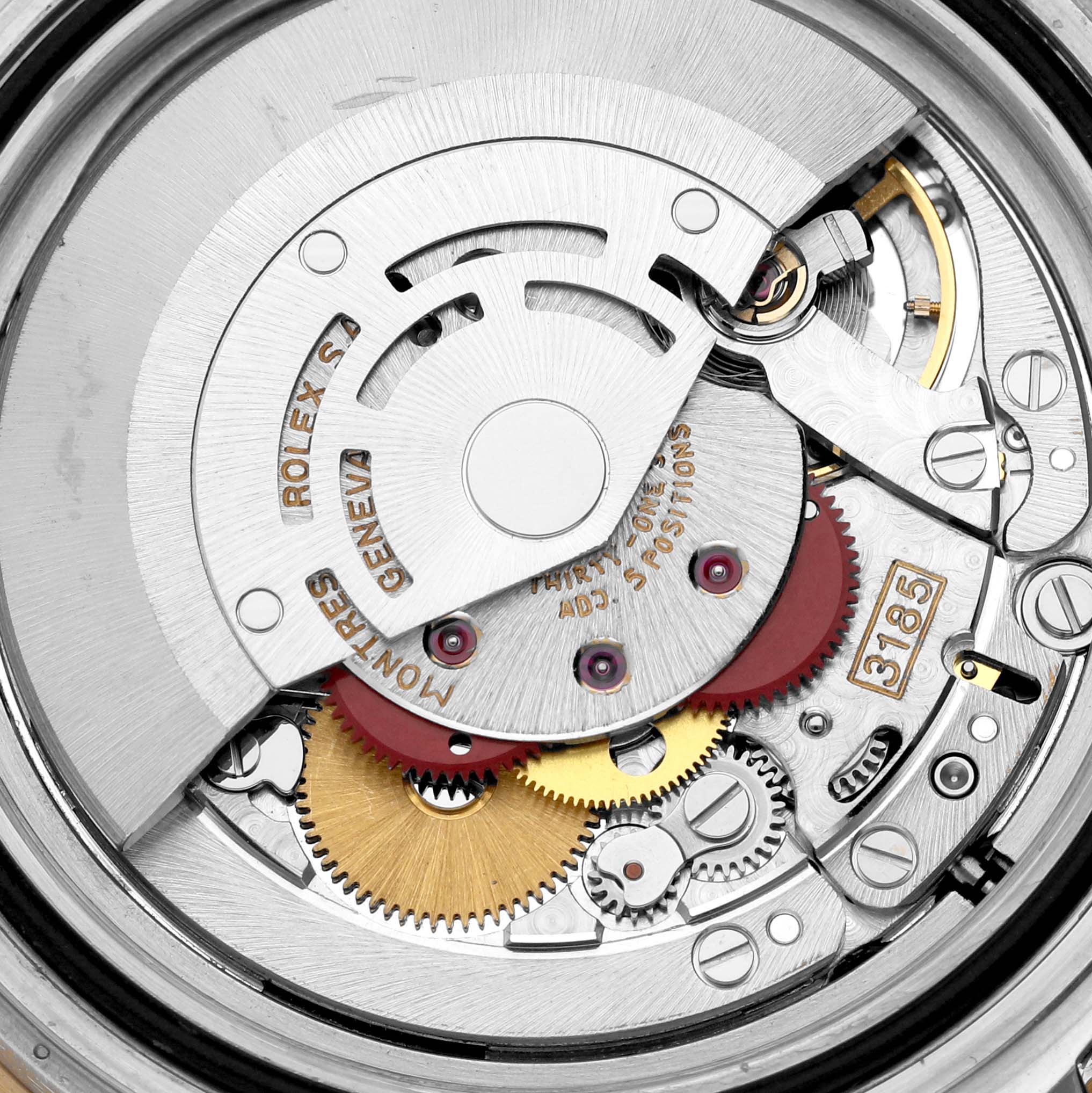 This image shows a detailed view of the movement mechanism of a Rolex GMT-Master 16713 Men's Steel and Gold (two tone) Black Dial 16713 Men's Steel and Gold (two tone) Black Dial watch.