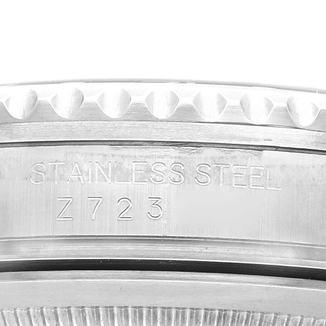 The image shows a close-up angle of the stainless steel case back and engraving of a Rolex GMT-Master 16710 Men's Stainless Steel Black Dial 16710 Men's Stainless Steel Black Dial watch.