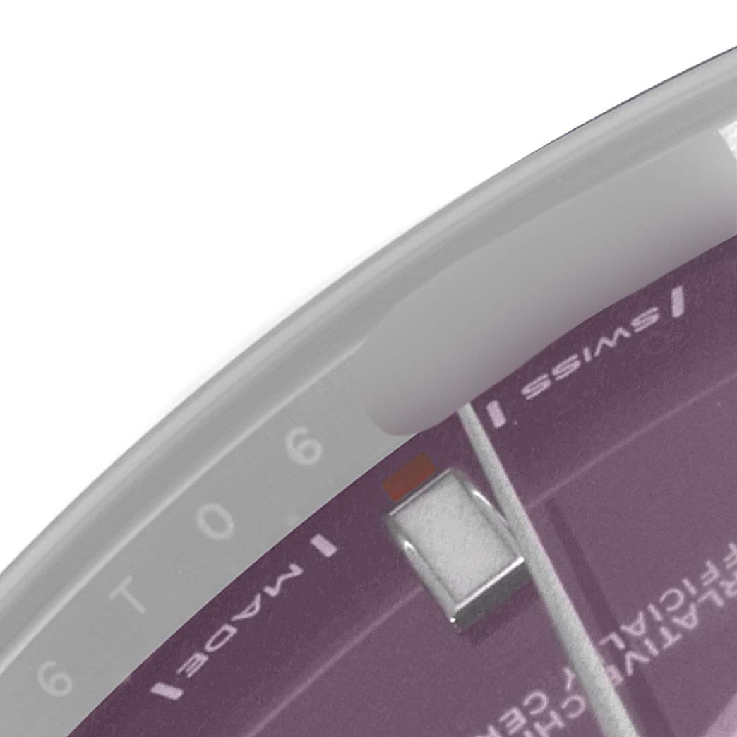 The image shows a close-up of the dial of a Rolex Oyster Perpetual 114300 Men's Stainless Steel Burgundy Dial 114300 Men's Stainless Steel Burgundy Dial watch, highlighting the "Swiss Made" text and hour markers.