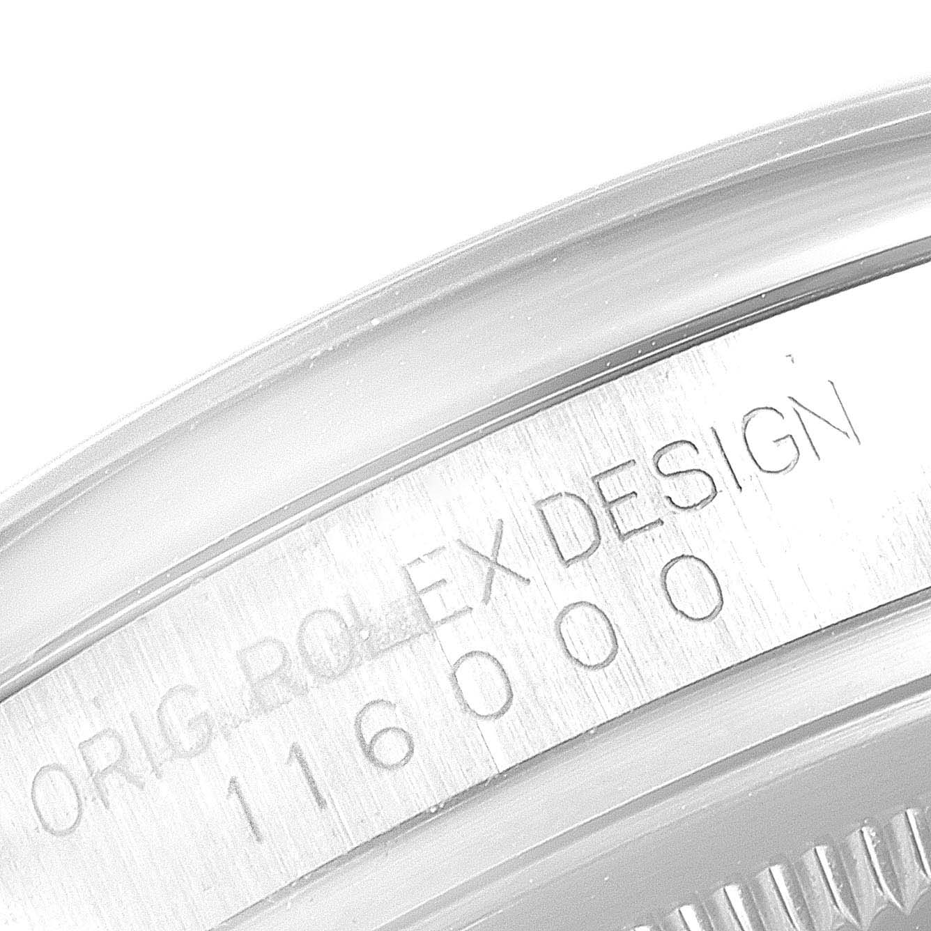 The image shows a close-up of the caseback engravings of a Rolex Oyster Perpetual 116000 Men
s Stainless Steel Grey Dial 116000 Men
s Stainless Steel Grey Dial model, displaying the text "ORG. ROLEX DESIGN" and the model number "116000".