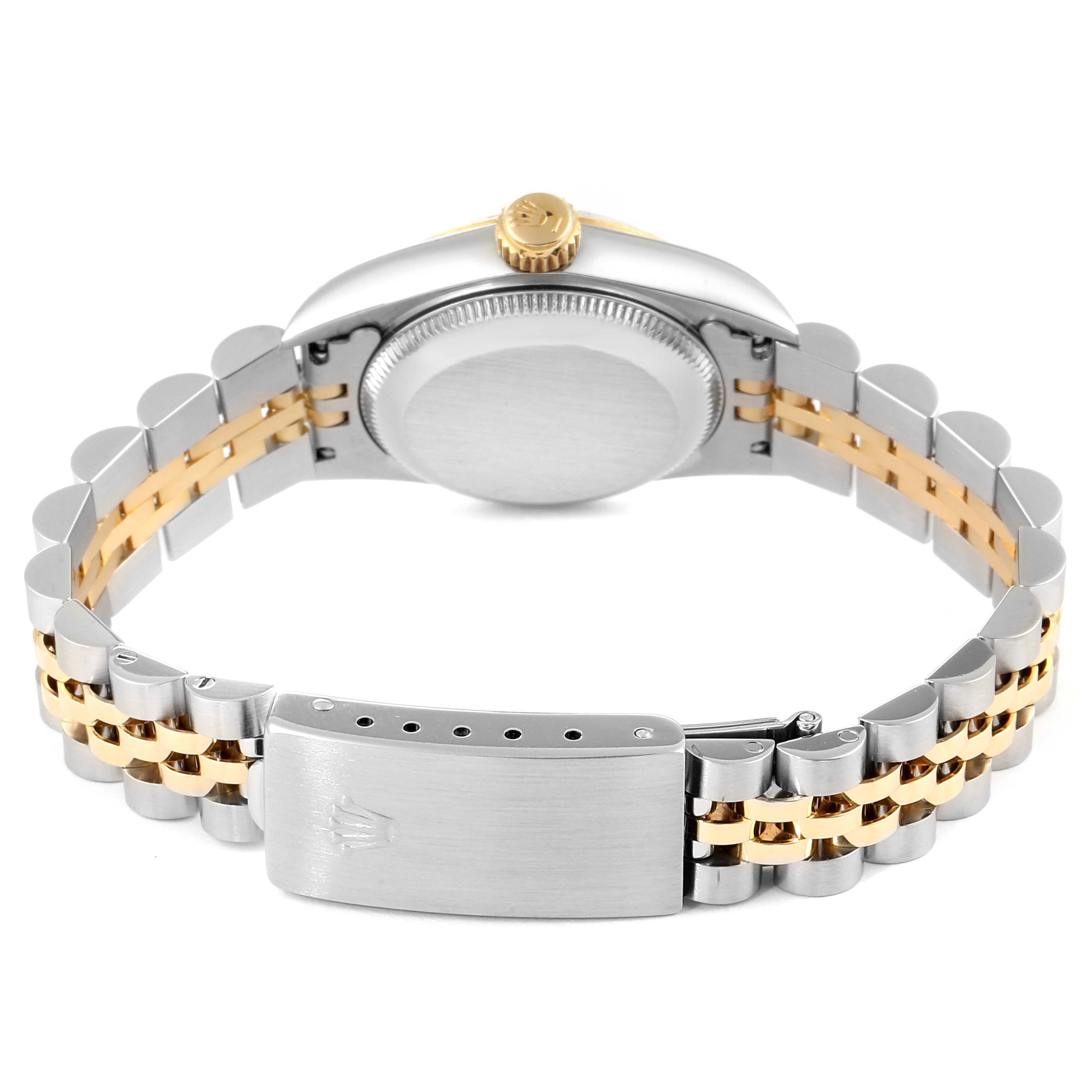 The image shows the back view of a Rolex Oyster Perpetual 67193 Women's Steel and Gold (two tone) Silver Dial 67193 Women's Steel and Gold (two tone) Silver Dial watch, highlighting the case back, crown, and two-tone bracelet with clasp.