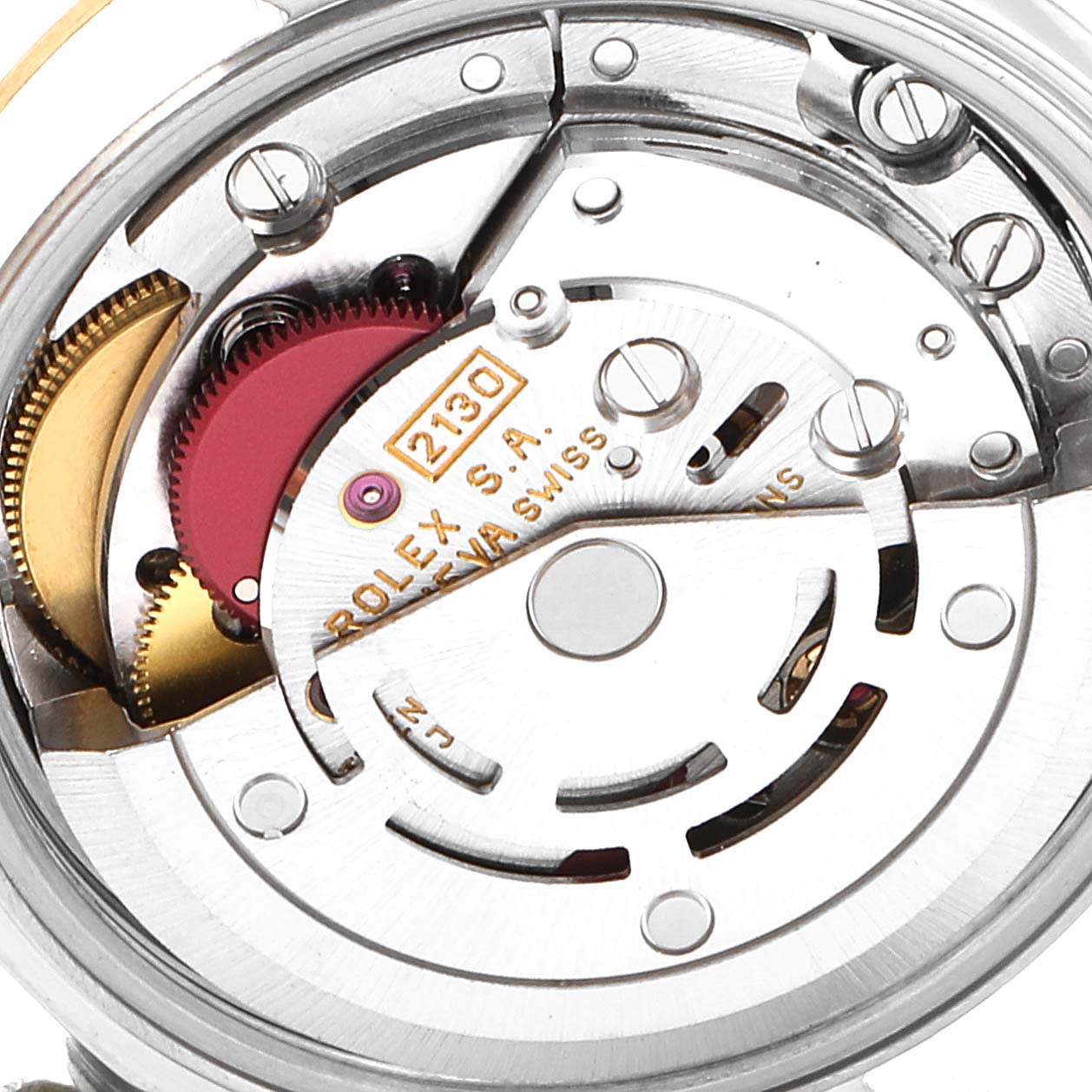 This is a close-up view of the movement mechanism inside a Rolex Oyster Perpetual 67193 Women's Steel and Gold (two tone) Silver Dial 67193 Women's Steel and Gold (two tone) Silver Dial watch, showing gears and the rotor.