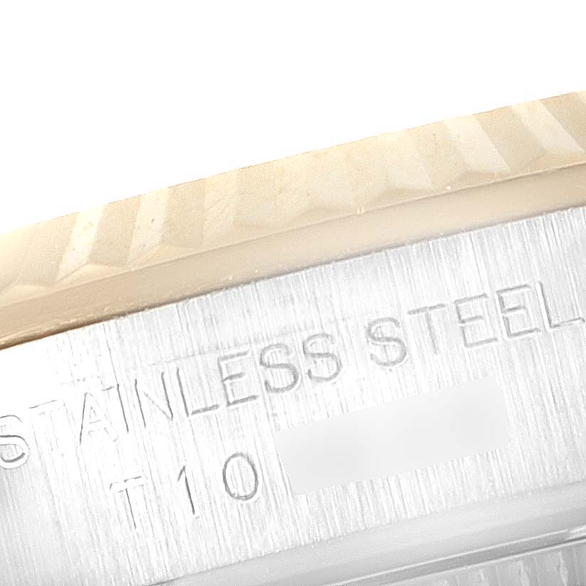 The image shows a close-up of the stainless steel casing of the Rolex Oyster Perpetual 67193 Women's Steel and Gold (two tone) Silver Dial 67193 Women's Steel and Gold (two tone) Silver Dial watch.