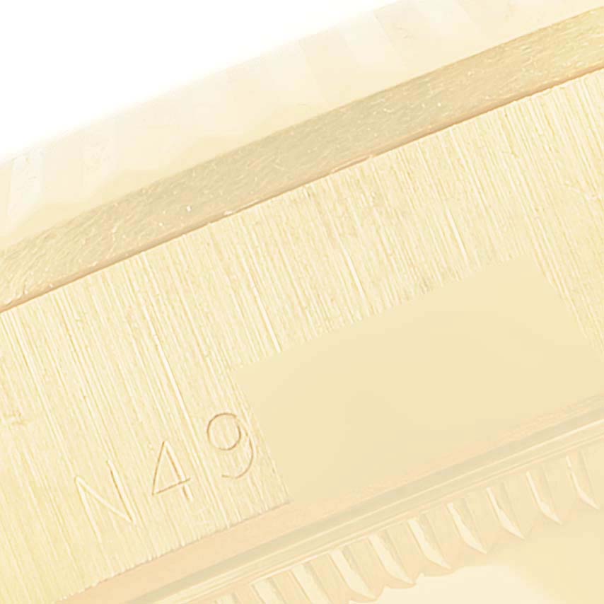 The image shows a close-up angle of the case side and part of the fluted bezel of a Rolex President 68278 Women
s Yellow Gold Champagne Dial 68278 Women
s Yellow Gold Champagne Dial model watch.