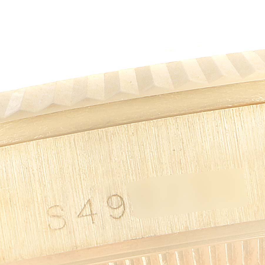 This is a close-up image of the engraved serial number on the side of the Rolex President 68278 Women
s Yellow Gold Champagne Dial 68278 Women
s Yellow Gold Champagne Dial model watch case.