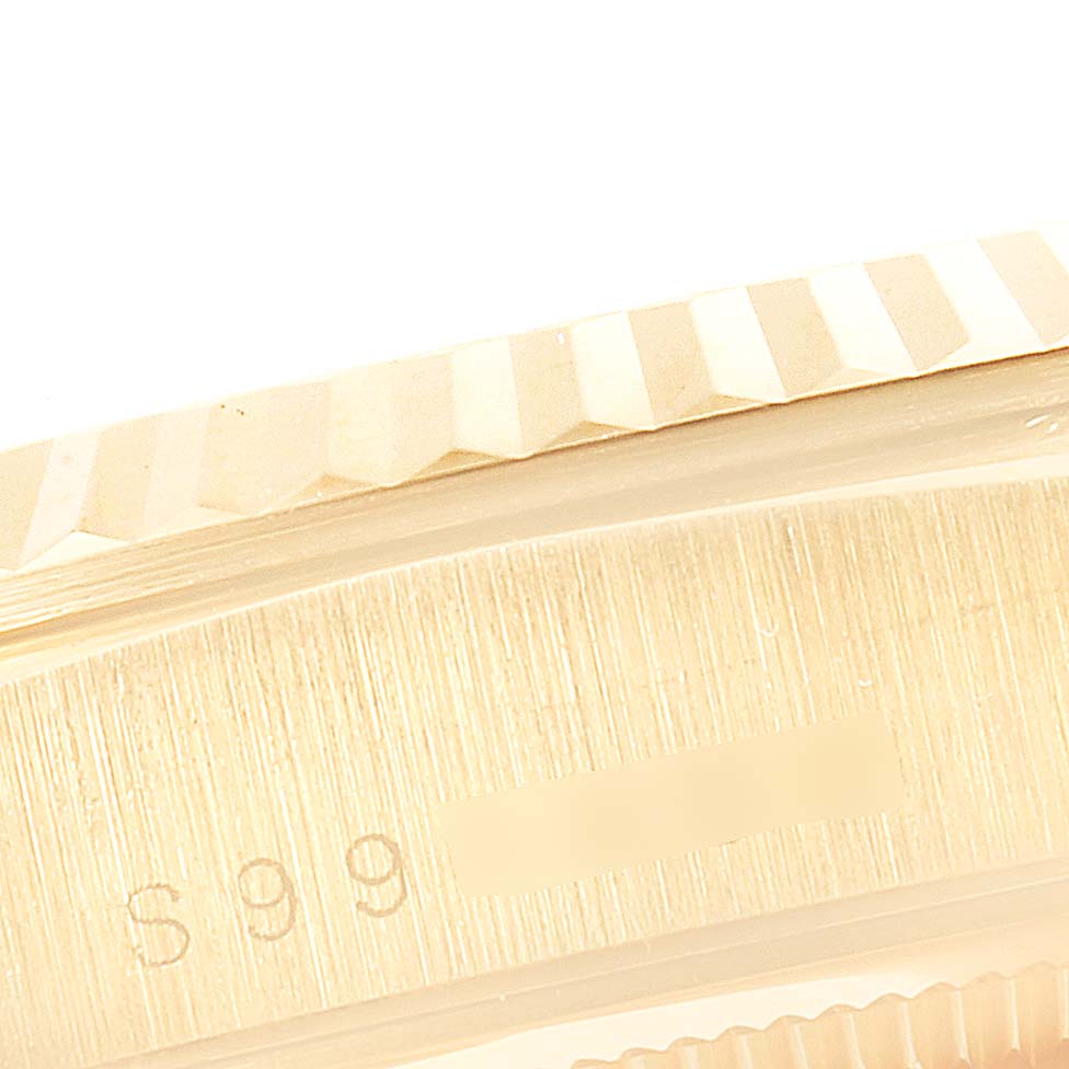 This image shows a close-up view of the case and fluted bezel of a Rolex President 18238 Men's Yellow Gold Champagne Dial 18238 Men's Yellow Gold Champagne Dial watch.